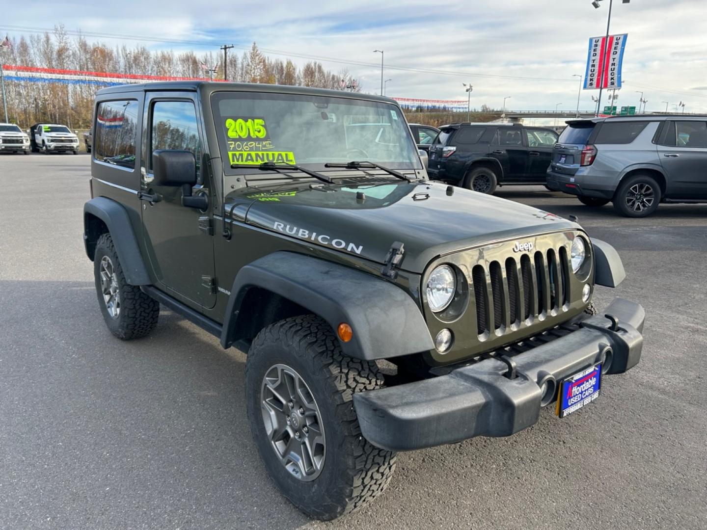 2015 GREEN JEEP WRANGLER RUBICON (1C4BJWCG5FL) with an 3.6L engine, 5-Speed Manual transmission, located at 2525 S. Cushman, Fairbanks, AK, 99701, (907) 452-5707, 64.824036, -147.712311- Photo#1