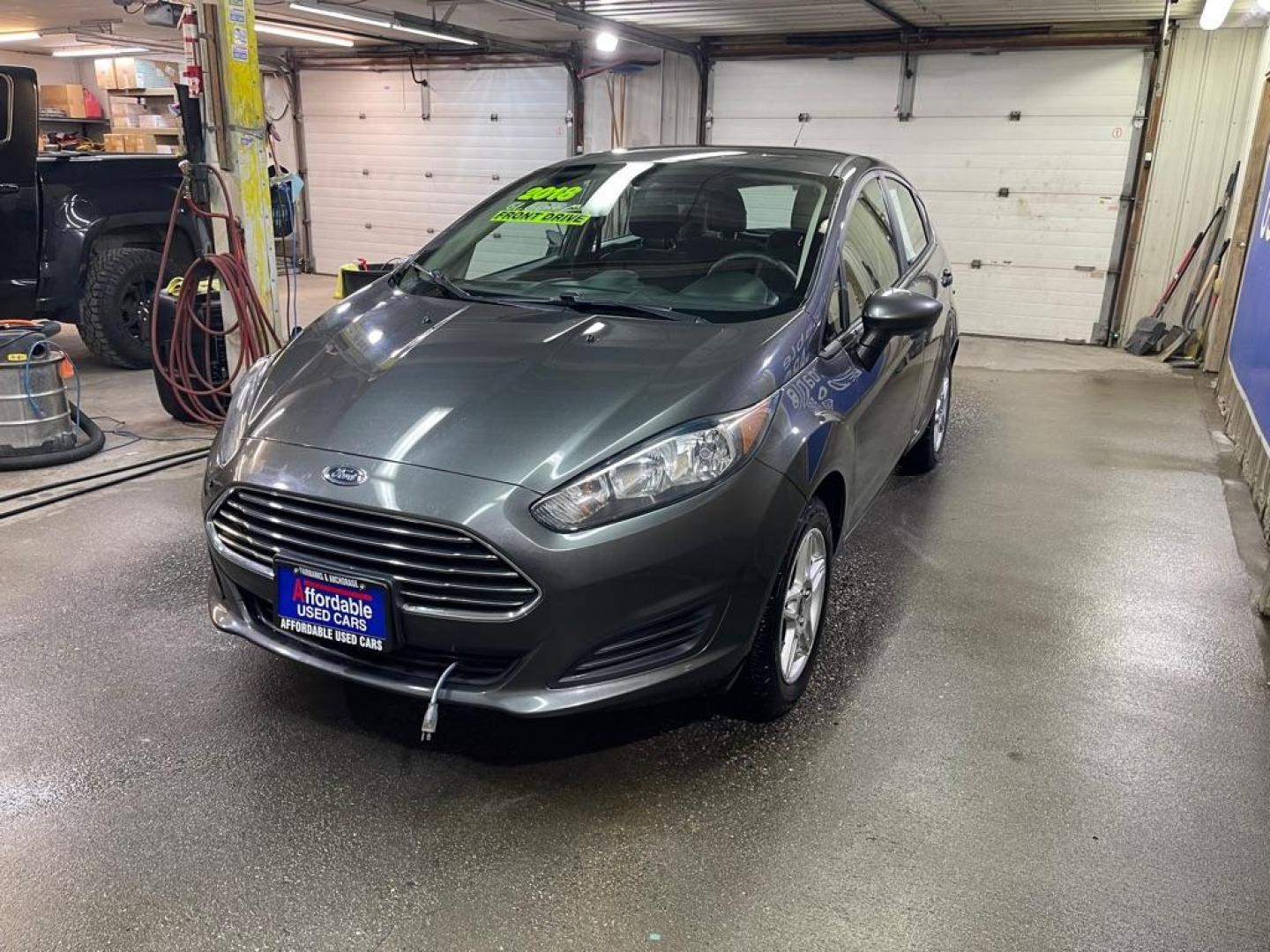 2018 GRAY FORD FIESTA SE (3FADP4EJ8JM) with an 1.6L engine, Automatic transmission, located at 2525 S. Cushman, Fairbanks, AK, 99701, (907) 452-5707, 64.824036, -147.712311 - Photo#1