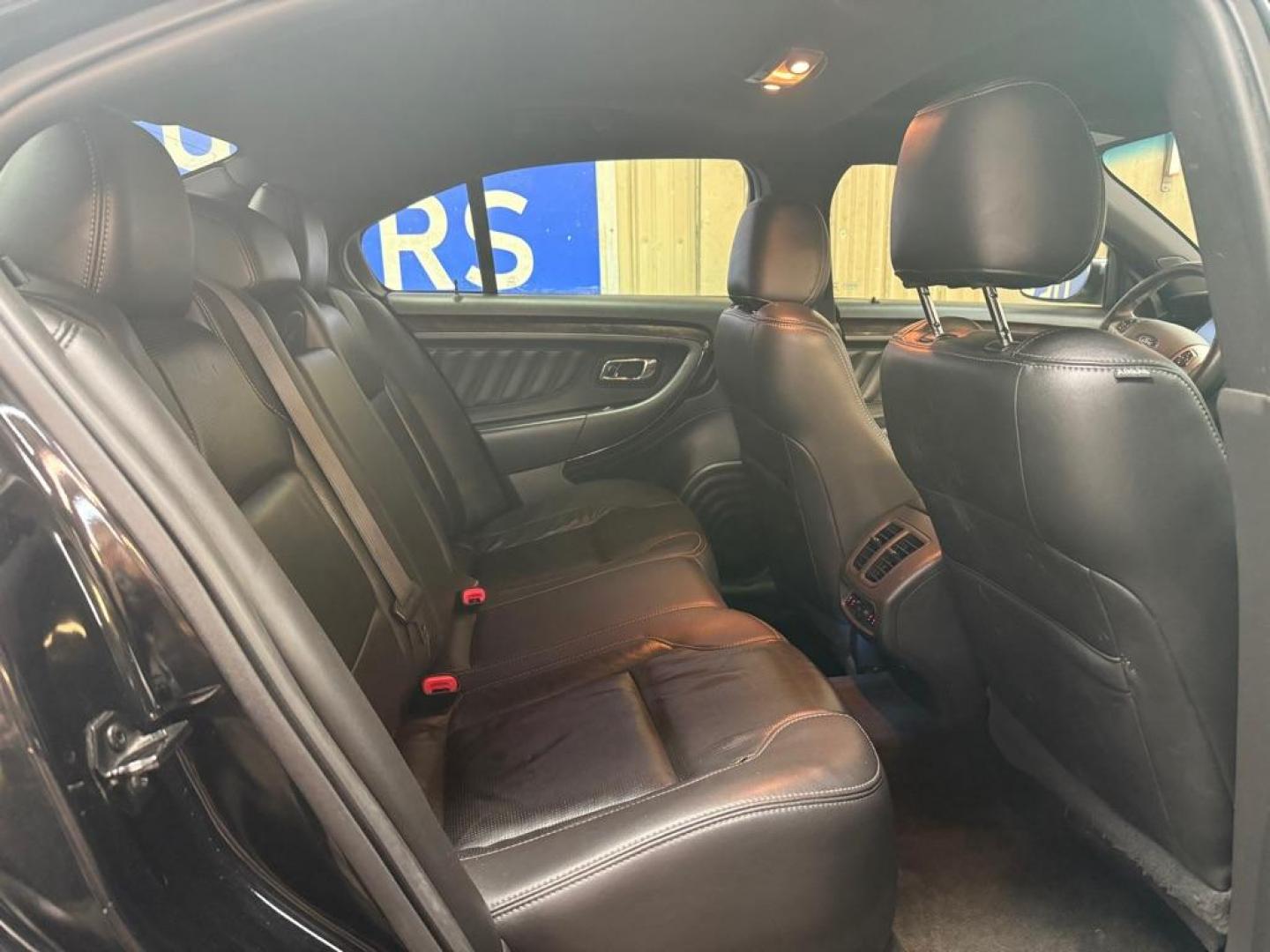 2017 BLACK FORD TAURUS LIMITED (1FAHP2F98HG) with an 2.0L engine, Automatic transmission, located at 2525 S. Cushman, Fairbanks, AK, 99701, (907) 452-5707, 64.824036, -147.712311 - Photo#4