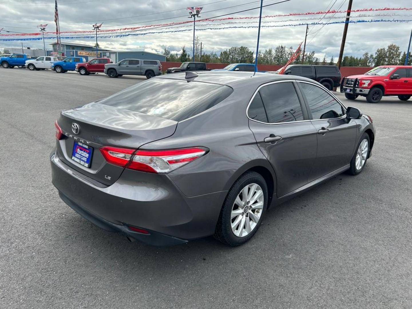 2019 GRAY TOYOTA CAMRY L (4T1B11HK6KU) with an 2.5L engine, Automatic transmission, located at 2525 S. Cushman, Fairbanks, AK, 99701, (907) 452-5707, 64.824036, -147.712311 - Photo#2