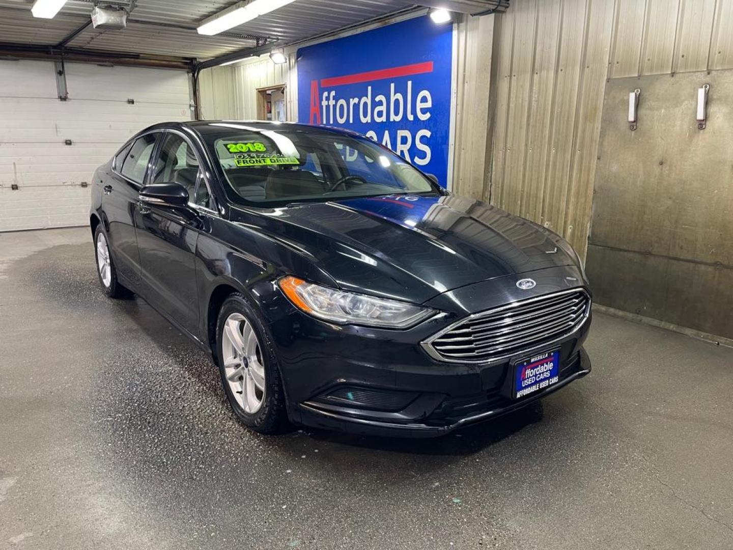 2018 BLACK FORD FUSION SE (3FA6P0H7XJR) with an 2.5L engine, Automatic transmission, located at 2525 S. Cushman, Fairbanks, AK, 99701, (907) 452-5707, 64.824036, -147.712311 - Photo#0