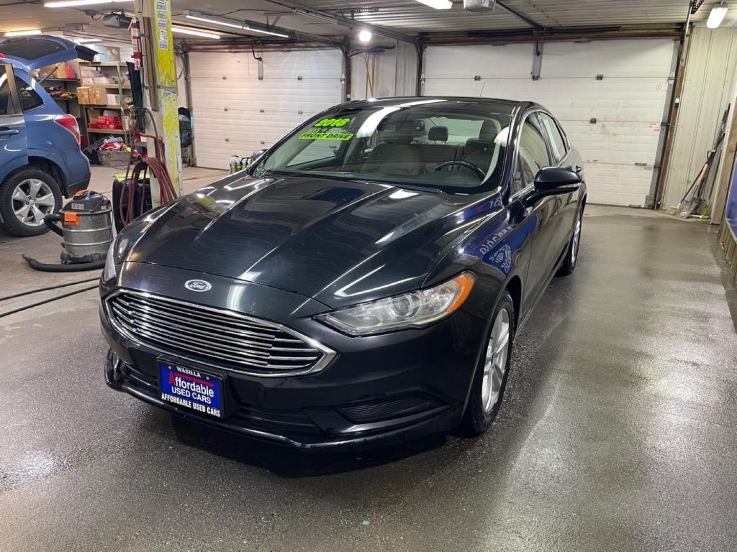 2018 BLACK FORD FUSION SE (3FA6P0H7XJR) with an 2.5L engine, Automatic transmission, located at 2525 S. Cushman, Fairbanks, AK, 99701, (907) 452-5707, 64.824036, -147.712311 - Photo#1