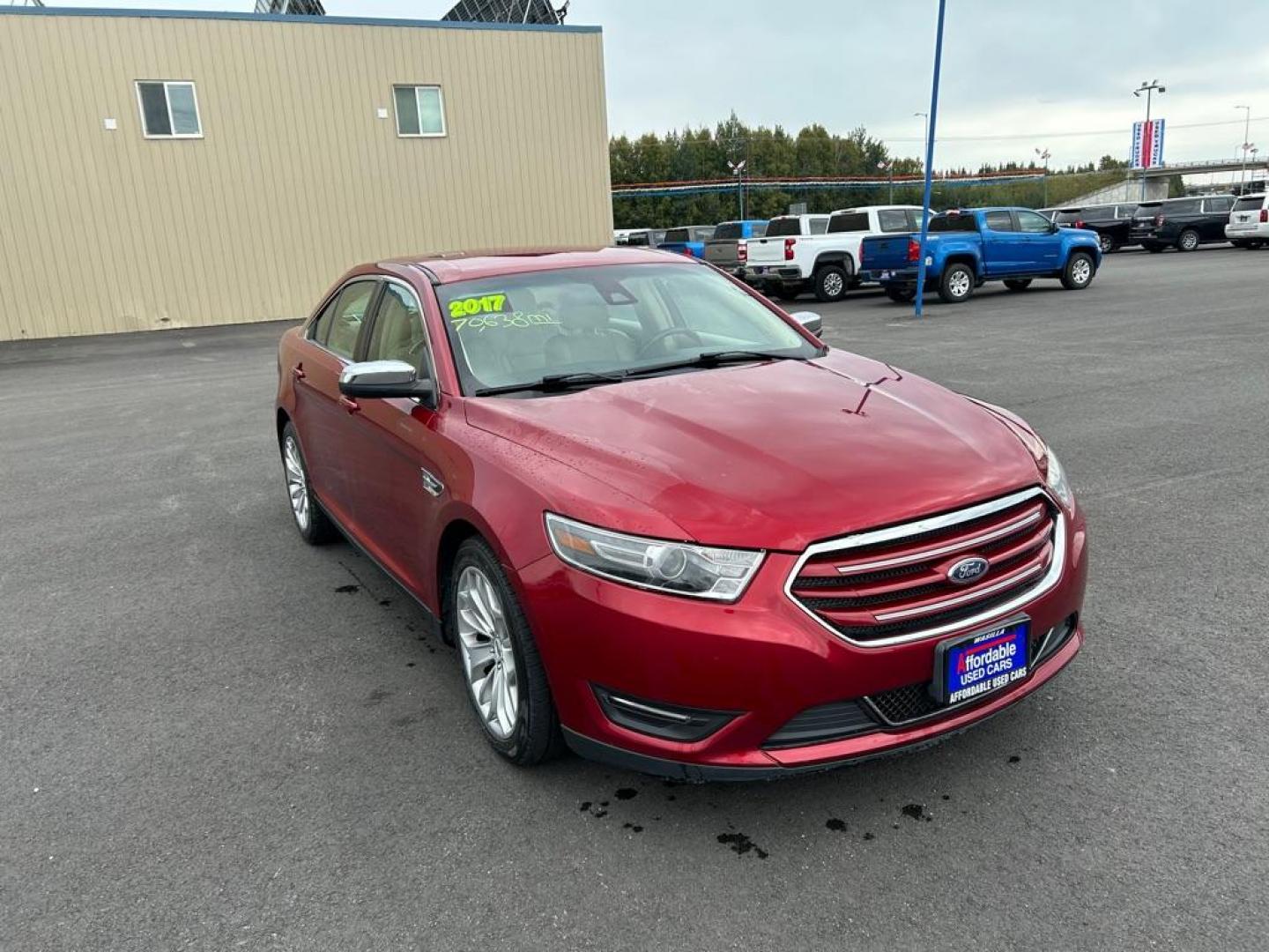 2017 RED FORD TAURUS LIMITED (1FAHP2F80HG) with an 3.5L engine, Automatic transmission, located at 2525 S. Cushman, Fairbanks, AK, 99701, (907) 452-5707, 64.824036, -147.712311 - Photo#1