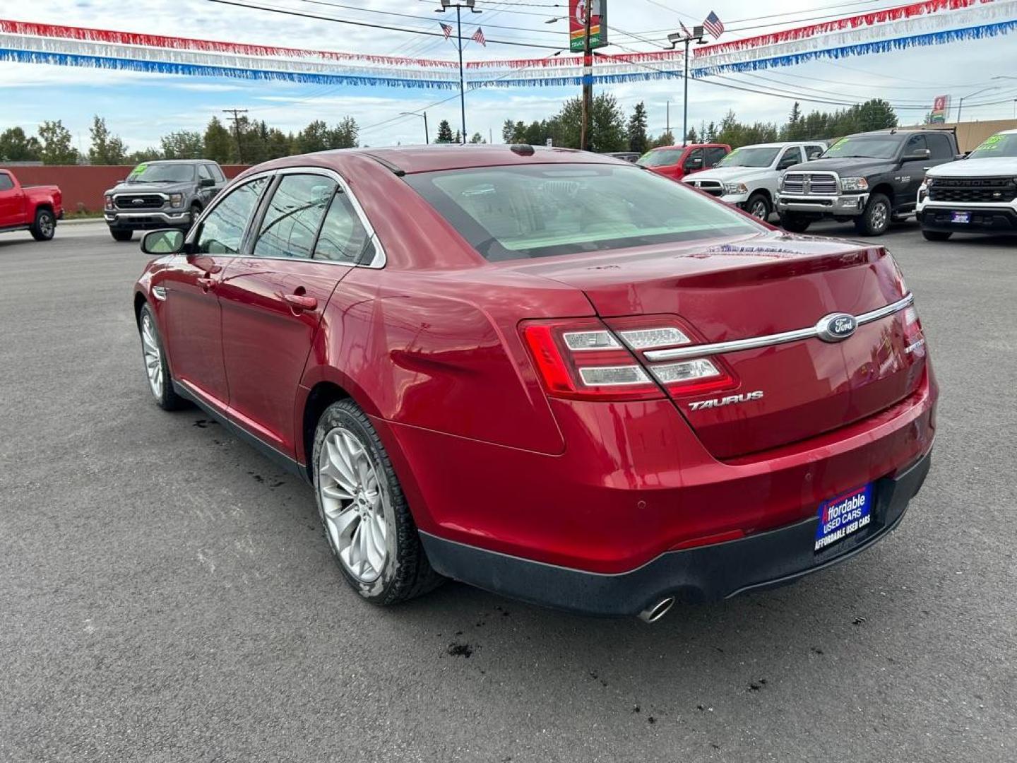 2017 RED FORD TAURUS LIMITED (1FAHP2F80HG) with an 3.5L engine, Automatic transmission, located at 2525 S. Cushman, Fairbanks, AK, 99701, (907) 452-5707, 64.824036, -147.712311 - Photo#3