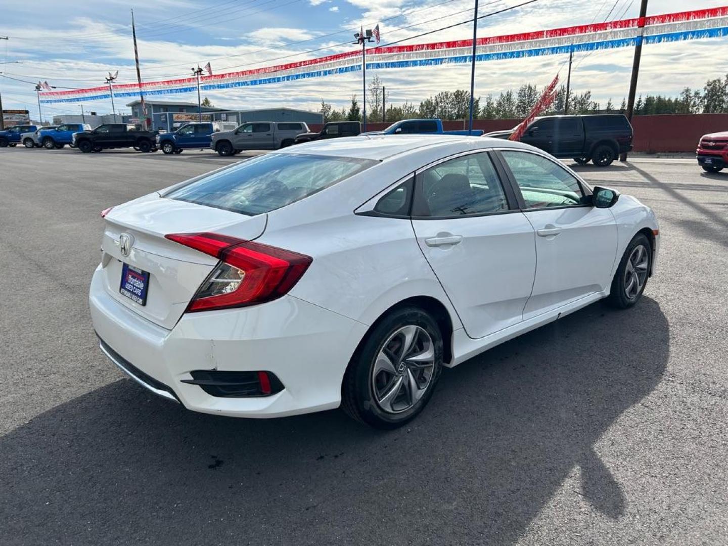 2019 WHITE HONDA CIVIC LX (2HGFC2F63KH) with an 2.0L engine, Continuously Variable transmission, located at 2525 S. Cushman, Fairbanks, AK, 99701, (907) 452-5707, 64.824036, -147.712311 - Photo#2