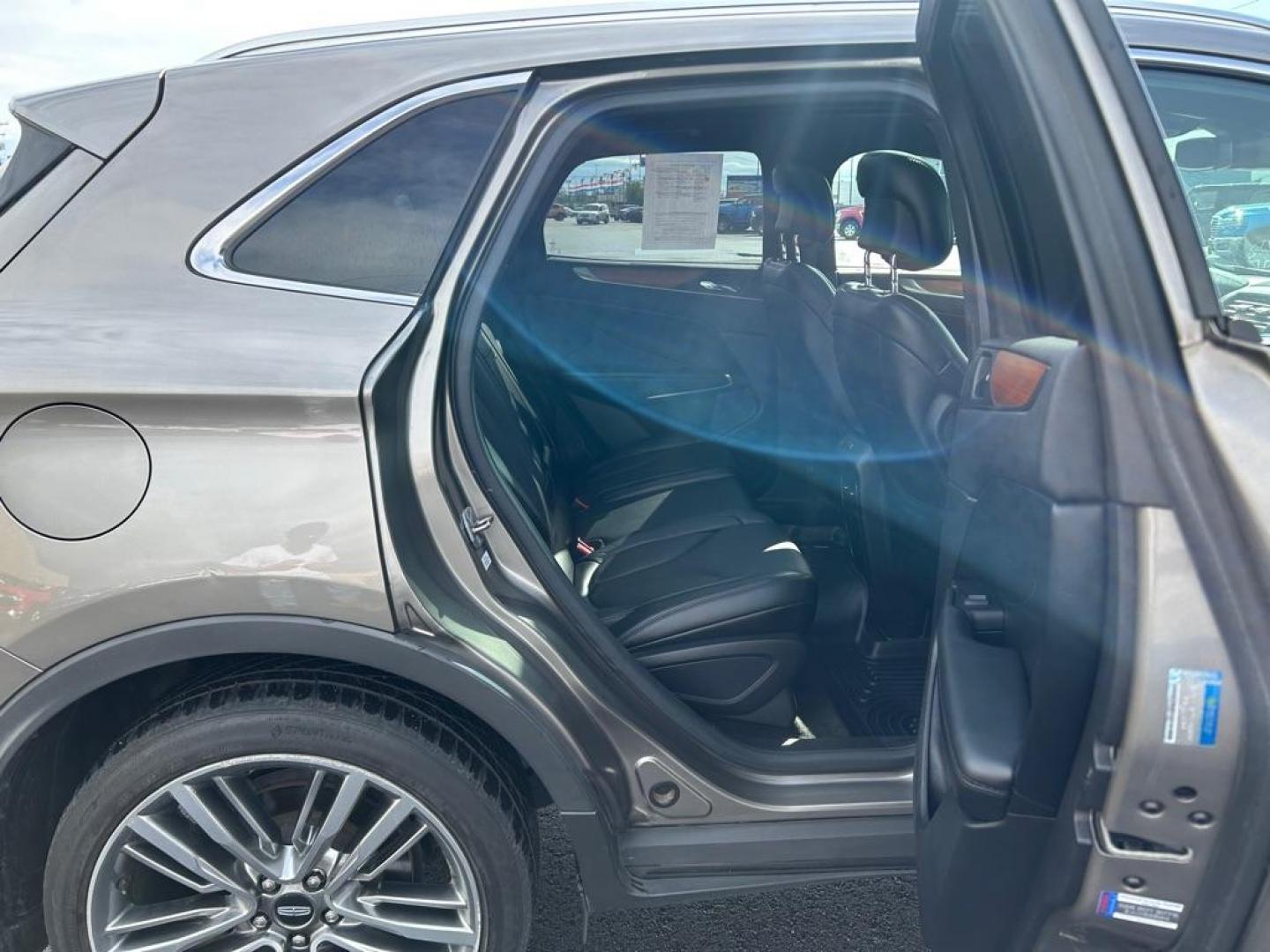 2016 BRONZE LINCOLN MKC RESERVE (5LMTJ3DH2GU) with an 2.3L engine, Automatic transmission, located at 2525 S. Cushman, Fairbanks, AK, 99701, (907) 452-5707, 64.824036, -147.712311 - Photo#5