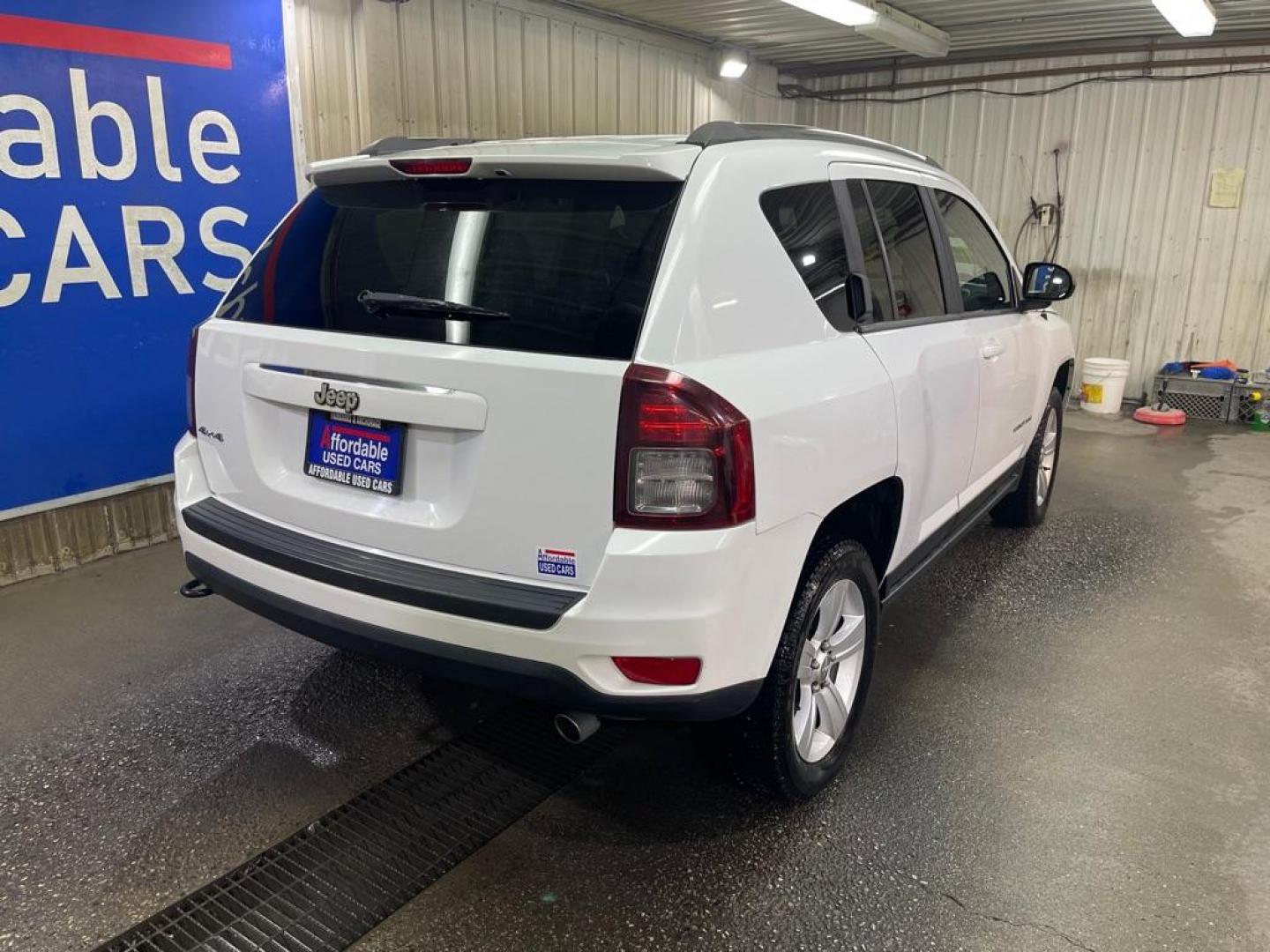 2014 WHITE JEEP COMPASS SPORT (1C4NJDBB3ED) with an 2.4L engine, Continuously Variable transmission, located at 2525 S. Cushman, Fairbanks, AK, 99701, (907) 452-5707, 64.824036, -147.712311 - Photo#2