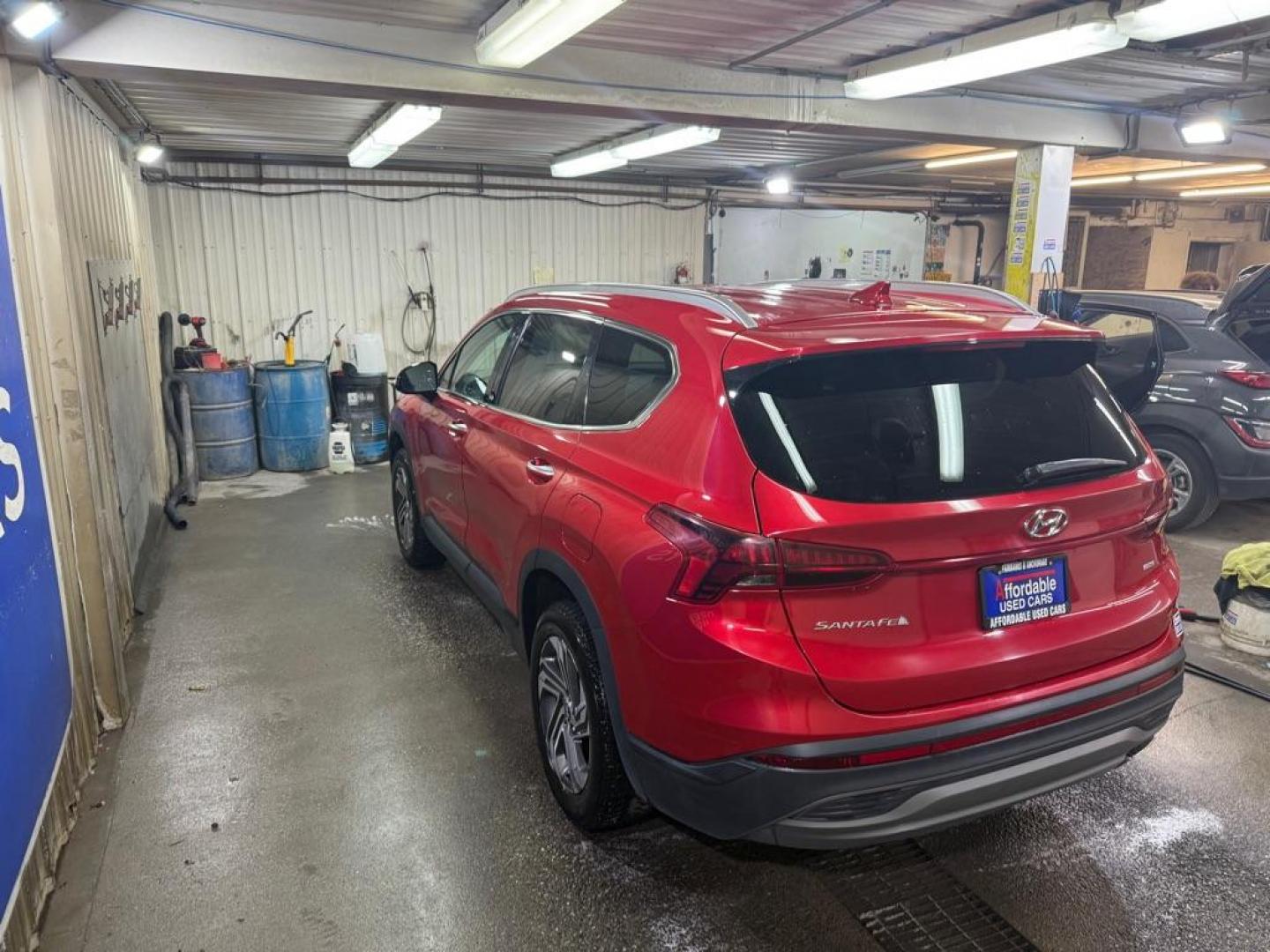 2023 RED HYUNDAI SANTA FE SEL (5NMS2DAJ0PH) with an 2.5L engine, Automatic transmission, located at 2525 S. Cushman, Fairbanks, AK, 99701, (907) 452-5707, 64.824036, -147.712311 - Photo#2