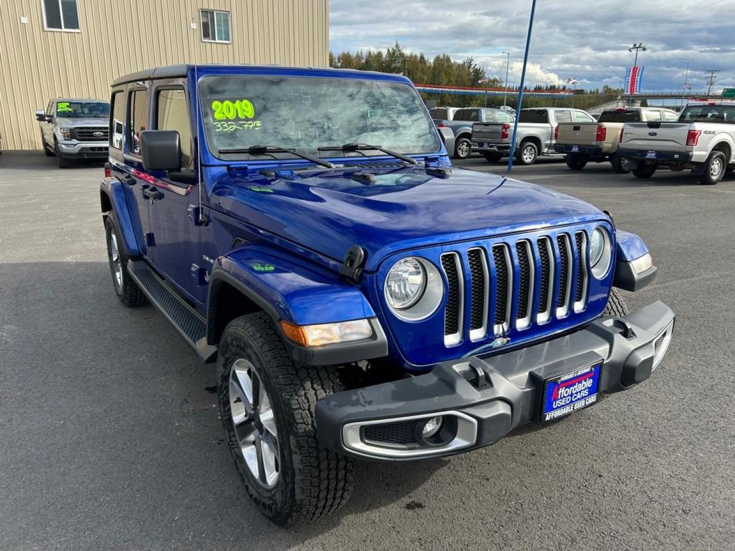 2019 BLUE JEEP WRANGLER UNLIMI SAHARA (1C4HJXEGXKW) with an 3.6L engine, Automatic transmission, located at 2525 S. Cushman, Fairbanks, AK, 99701, (907) 452-5707, 64.824036, -147.712311 - Photo#1