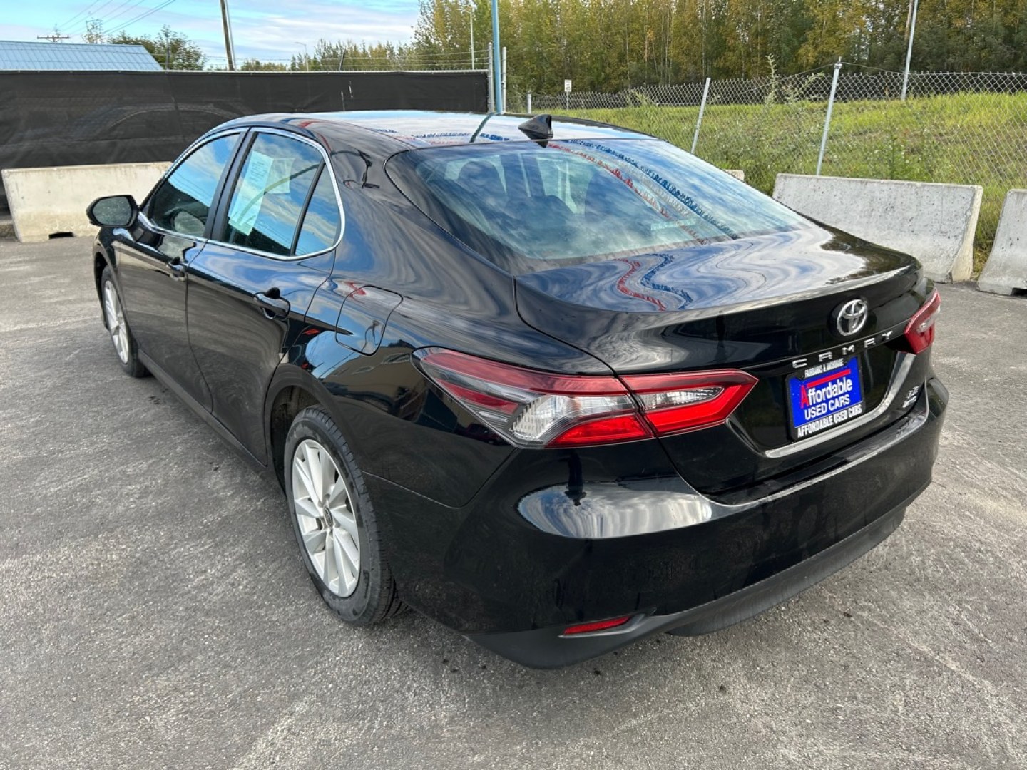 2023 BLACK TOYOTA CAMRY LE LE (4T1C11BK9PU) with an 2.5L engine, Automatic transmission, located at 2525 S. Cushman, Fairbanks, AK, 99701, (907) 452-5707, 64.824036, -147.712311- Photo#3