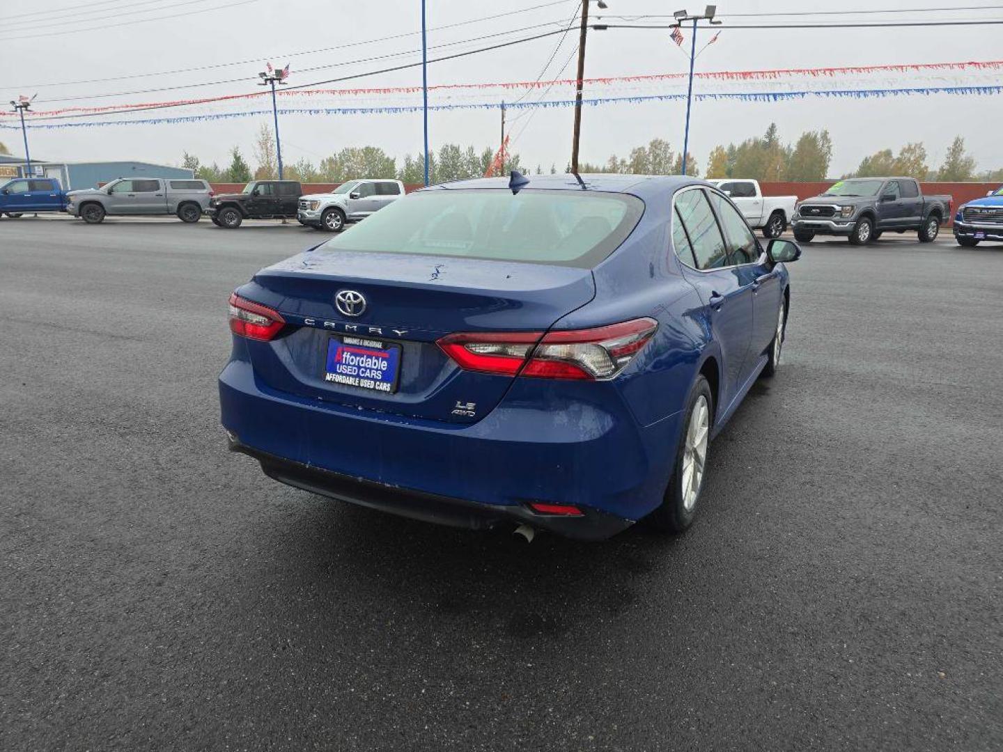 2023 BLUE TOYOTA CAMRY LE LE (4T1C11BK1PU) with an 2.5L engine, Automatic transmission, located at 2525 S. Cushman, Fairbanks, AK, 99701, (907) 452-5707, 64.824036, -147.712311 - Photo#2