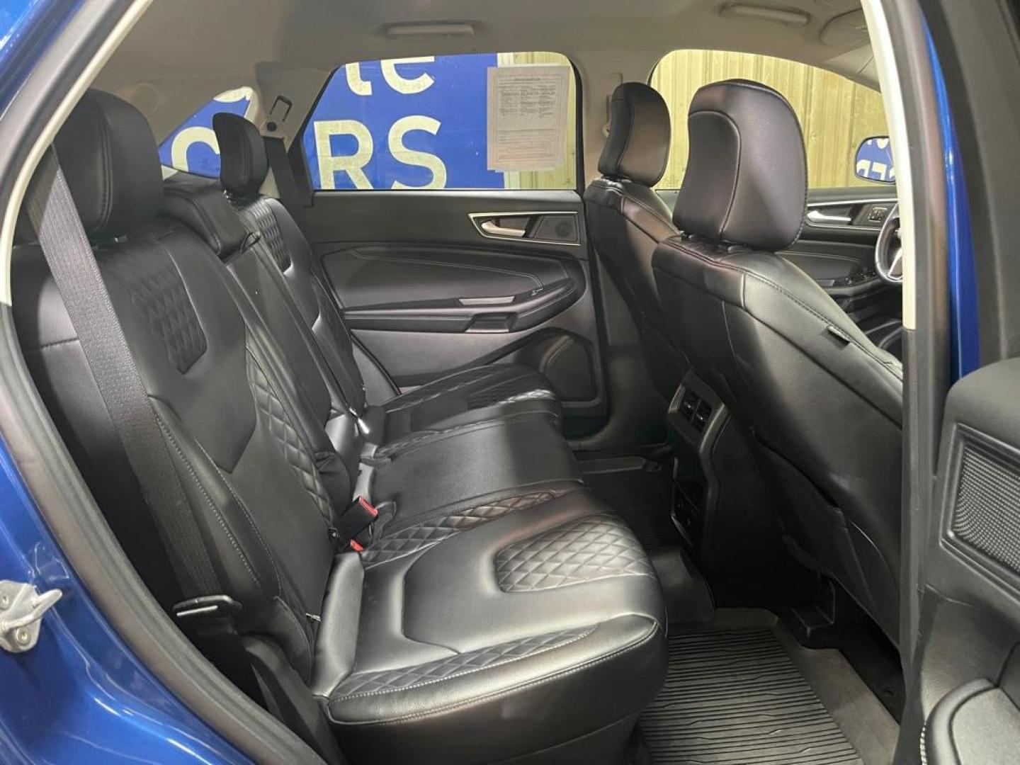 2023 BLUE FORD EDGE TITANIUM (2FMPK4K96PB) with an 2.0L engine, Automatic transmission, located at 2525 S. Cushman, Fairbanks, AK, 99701, (907) 452-5707, 64.824036, -147.712311 - Photo#4