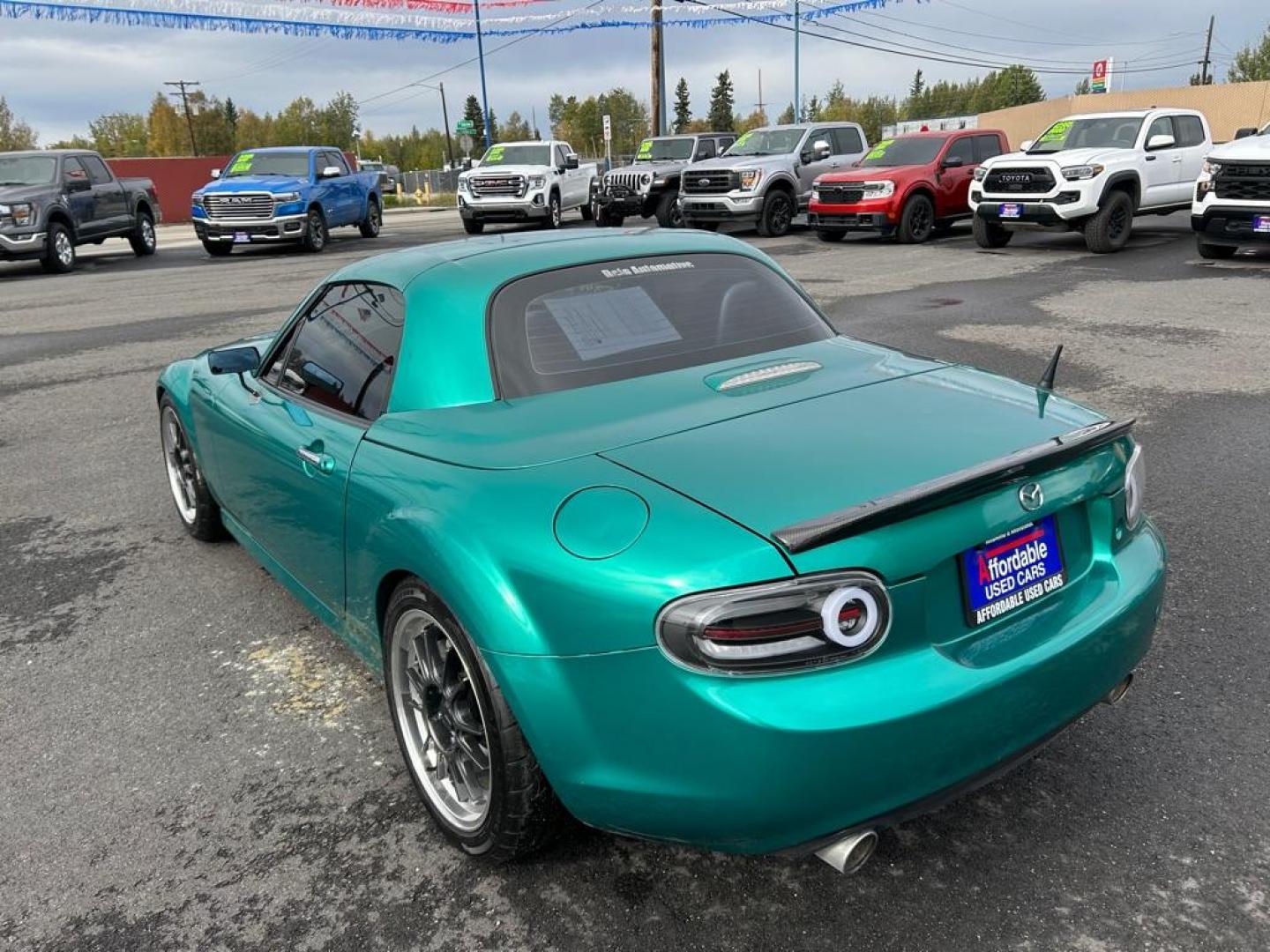 2015 GREEN MAZDA MX-5 MIATA GRAND TOURING (JM1NC2PF0F0) with an 2.0L engine, Automatic transmission, located at 2525 S. Cushman, Fairbanks, AK, 99701, (907) 452-5707, 64.824036, -147.712311 - Photo#3