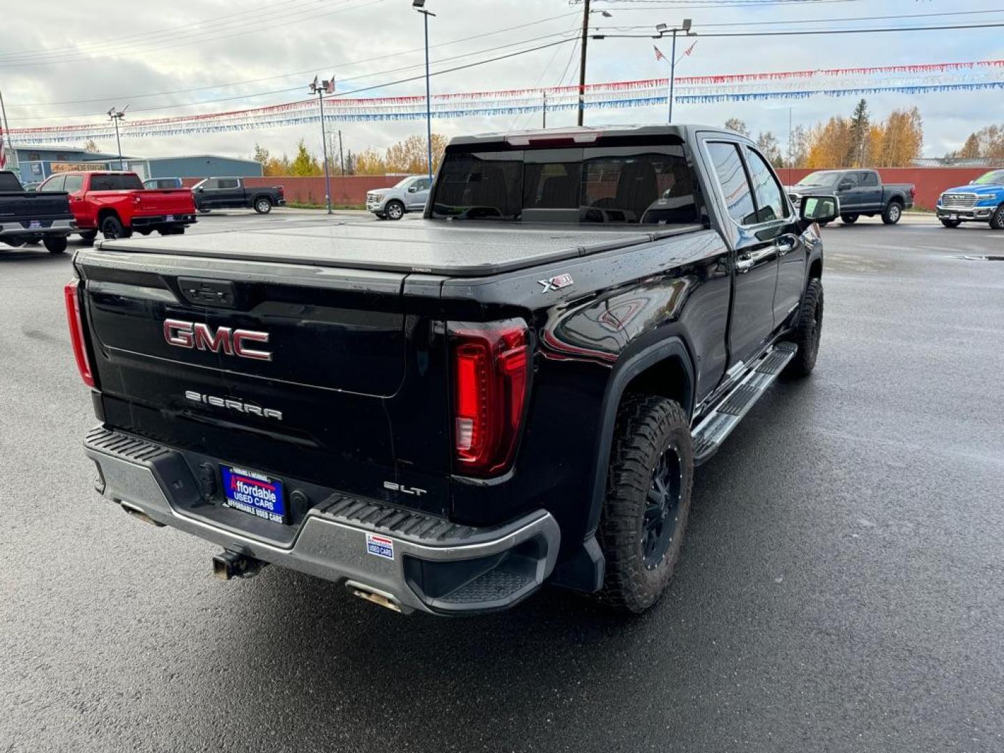 2022 BLACK GMC SIERRA LIMITED 1500 SLT (3GTU9DED8NG) with an 5.3L engine, Automatic transmission, located at 2525 S. Cushman, Fairbanks, AK, 99701, (907) 452-5707, 64.824036, -147.712311 - Photo#2