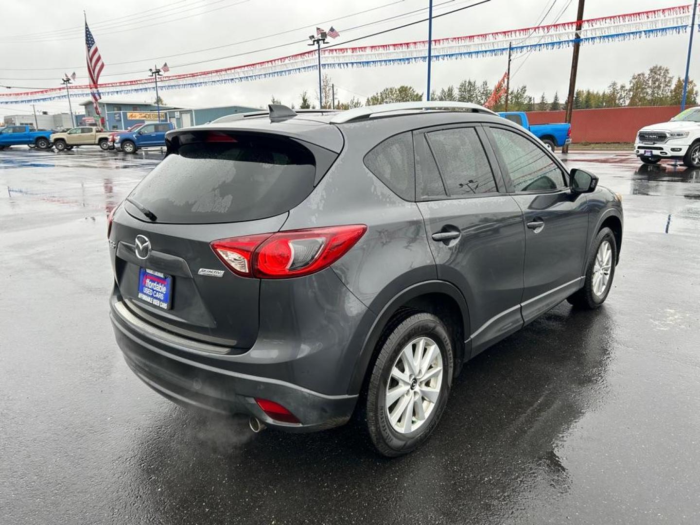 2014 GREY MAZDA CX-5 TOURING (JM3KE2CY2E0) with an 2.5L engine, Automatic transmission, located at 2525 S. Cushman, Fairbanks, AK, 99701, (907) 452-5707, 64.824036, -147.712311 - Photo#2