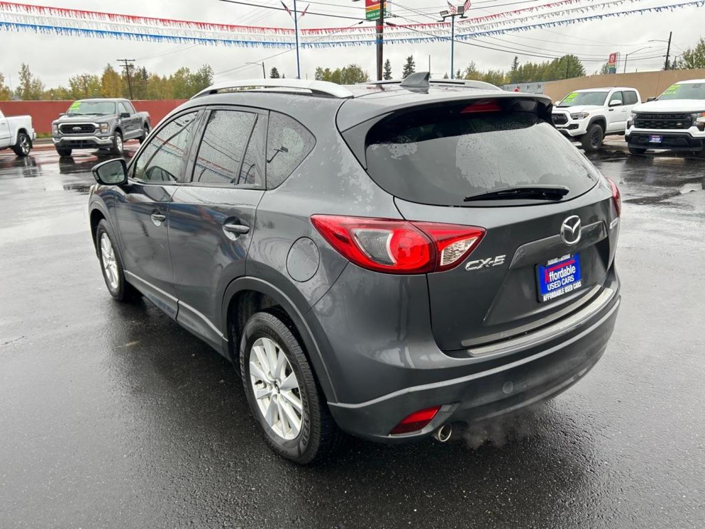 2014 GREY MAZDA CX-5 TOURING (JM3KE2CY2E0) with an 2.5L engine, Automatic transmission, located at 2525 S. Cushman, Fairbanks, AK, 99701, (907) 452-5707, 64.824036, -147.712311 - Photo#3