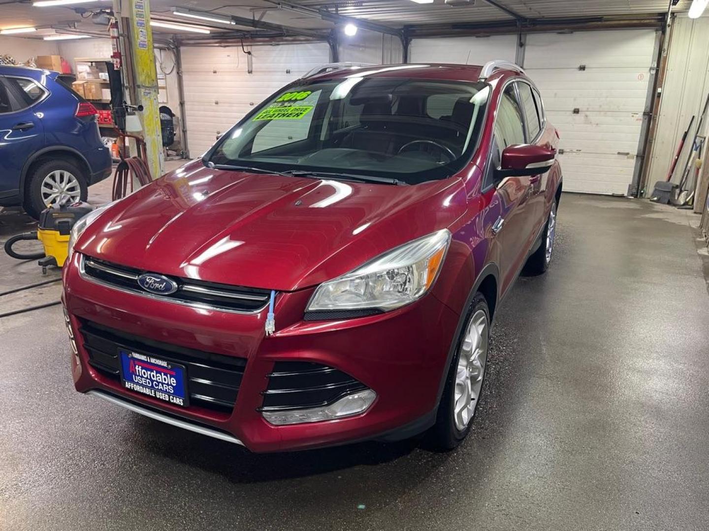 2016 RED FORD ESCAPE TITANIUM (1FMCU9J96GU) with an 2.0L engine, Automatic transmission, located at 2525 S. Cushman, Fairbanks, AK, 99701, (907) 452-5707, 64.824036, -147.712311 - Photo#1