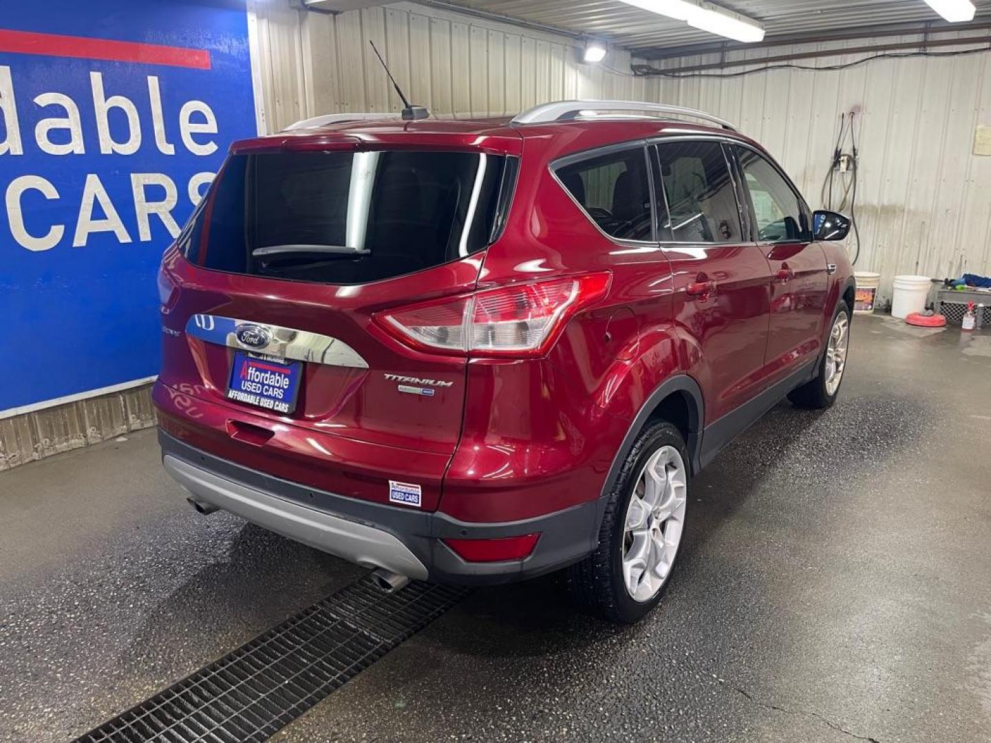 2016 RED FORD ESCAPE TITANIUM (1FMCU9J96GU) with an 2.0L engine, Automatic transmission, located at 2525 S. Cushman, Fairbanks, AK, 99701, (907) 452-5707, 64.824036, -147.712311 - Photo#2