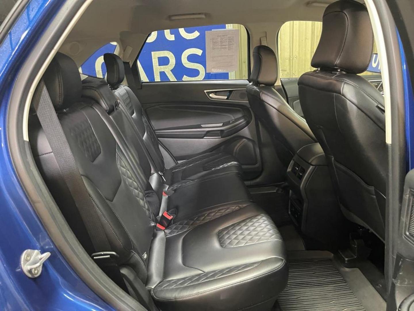 2023 BLUE FORD EDGE TITANIUM (2FMPK4K90PB) with an 2.0L engine, Automatic transmission, located at 2525 S. Cushman, Fairbanks, AK, 99701, (907) 452-5707, 64.824036, -147.712311 - Photo#4