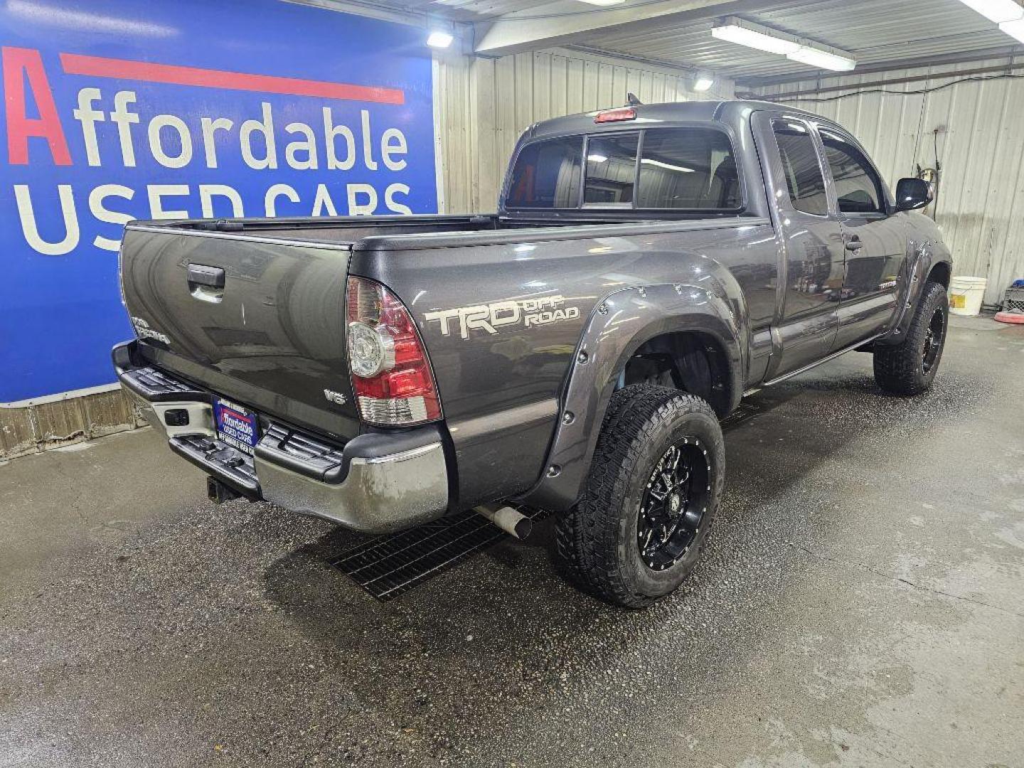2015 GREY TOYOTA TACOMA ACCESS CAB (5TFUU4EN4FX) with an 4.0L engine, Automatic transmission, located at 2525 S. Cushman, Fairbanks, AK, 99701, (907) 452-5707, 64.824036, -147.712311 - Photo#1