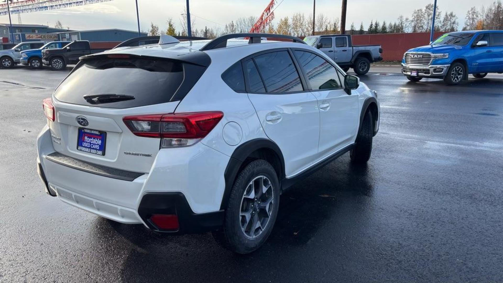2020 WHITE SUBARU CROSSTREK PREMIUM (JF2GTAECXL8) with an 2.0L engine, Continuously Variable transmission, located at 2525 S. Cushman, Fairbanks, AK, 99701, (907) 452-5707, 64.824036, -147.712311 - Photo#5