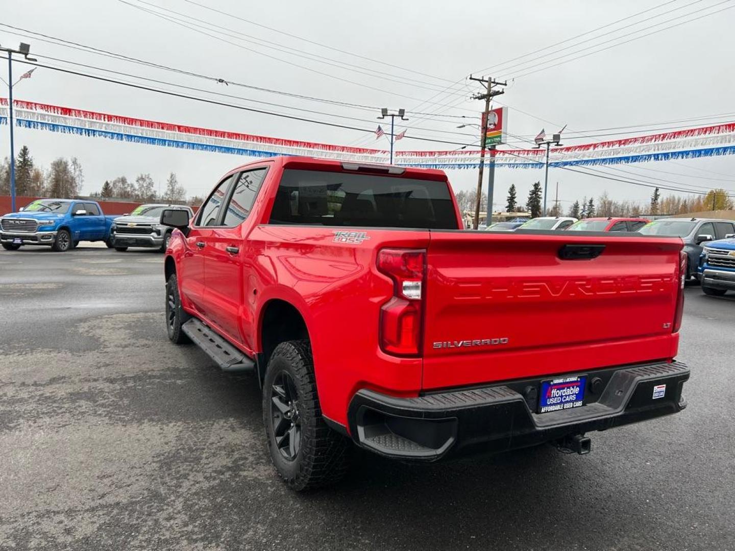 2024 RED CHEVROLET SILVERADO 1500 LT TRAIL BOSS (3GCPDFEK2RG) with an 2.7L engine, Automatic transmission, located at 2525 S. Cushman, Fairbanks, AK, 99701, (907) 452-5707, 64.824036, -147.712311 - Photo#3