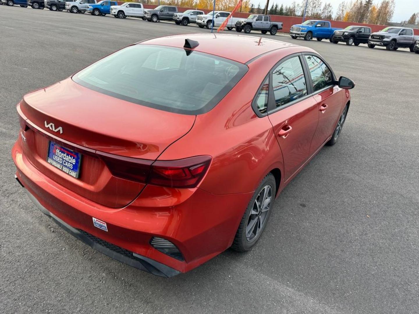 2023 ORANGE KIA FORTE LX (3KPF24AD1PE) with an 2L engine, Continuously Variable transmission, located at 2525 S. Cushman, Fairbanks, AK, 99701, (907) 452-5707, 64.824036, -147.712311 - Photo#2