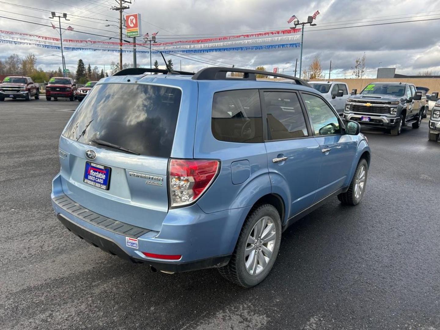 2012 BLUE SUBARU FORESTER 2.5X PREMIUM (JF2SHADC7CG) with an 2.5L engine, Manual transmission, located at 2525 S. Cushman, Fairbanks, AK, 99701, (907) 452-5707, 64.824036, -147.712311 - Photo#2