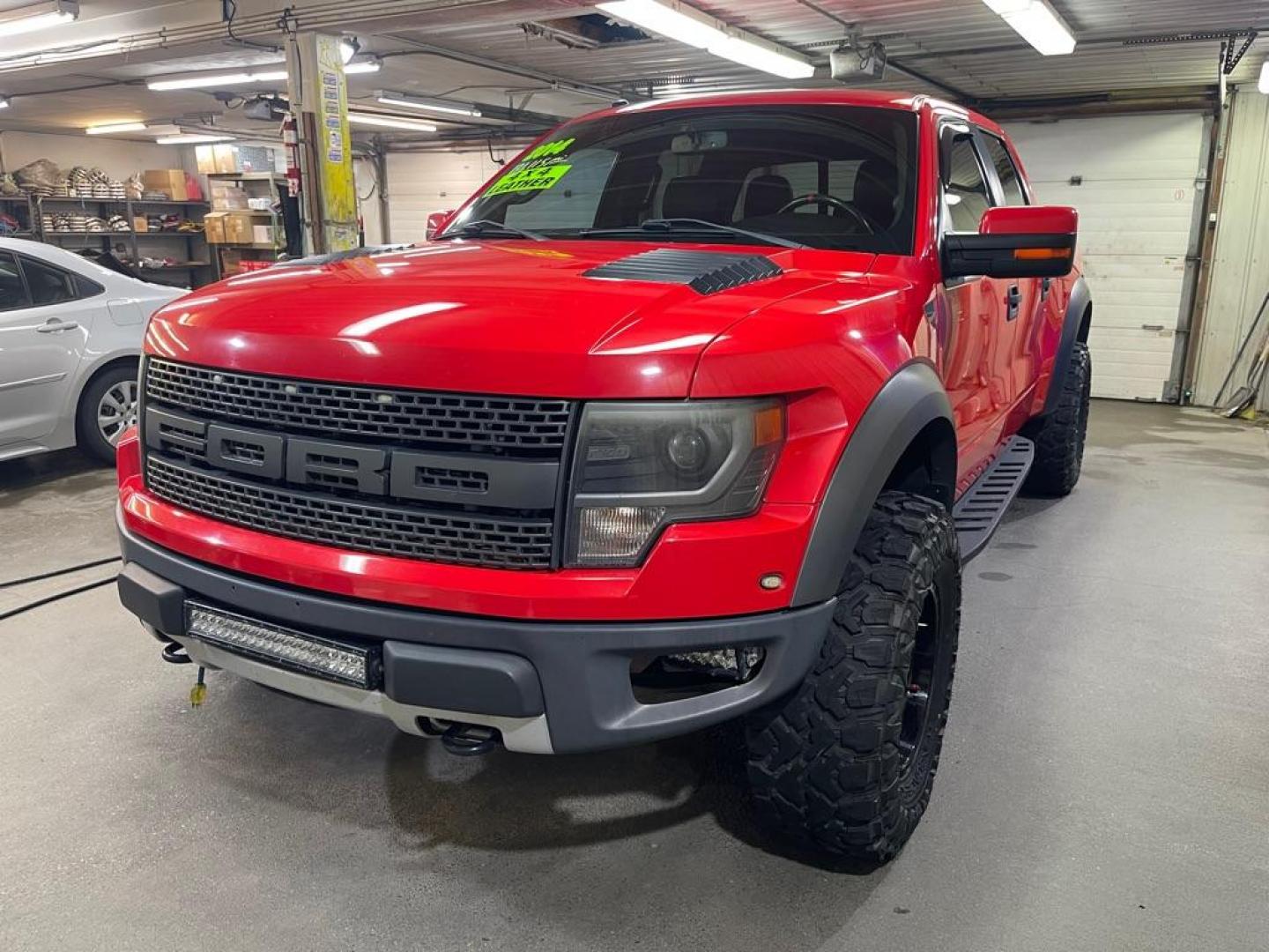 2014 RED FORD F150 SVT RAPTOR (1FTFW1R6XEF) with an 6.2L engine, Automatic transmission, located at 2525 S. Cushman, Fairbanks, AK, 99701, (907) 452-5707, 64.824036, -147.712311 - Photo#1