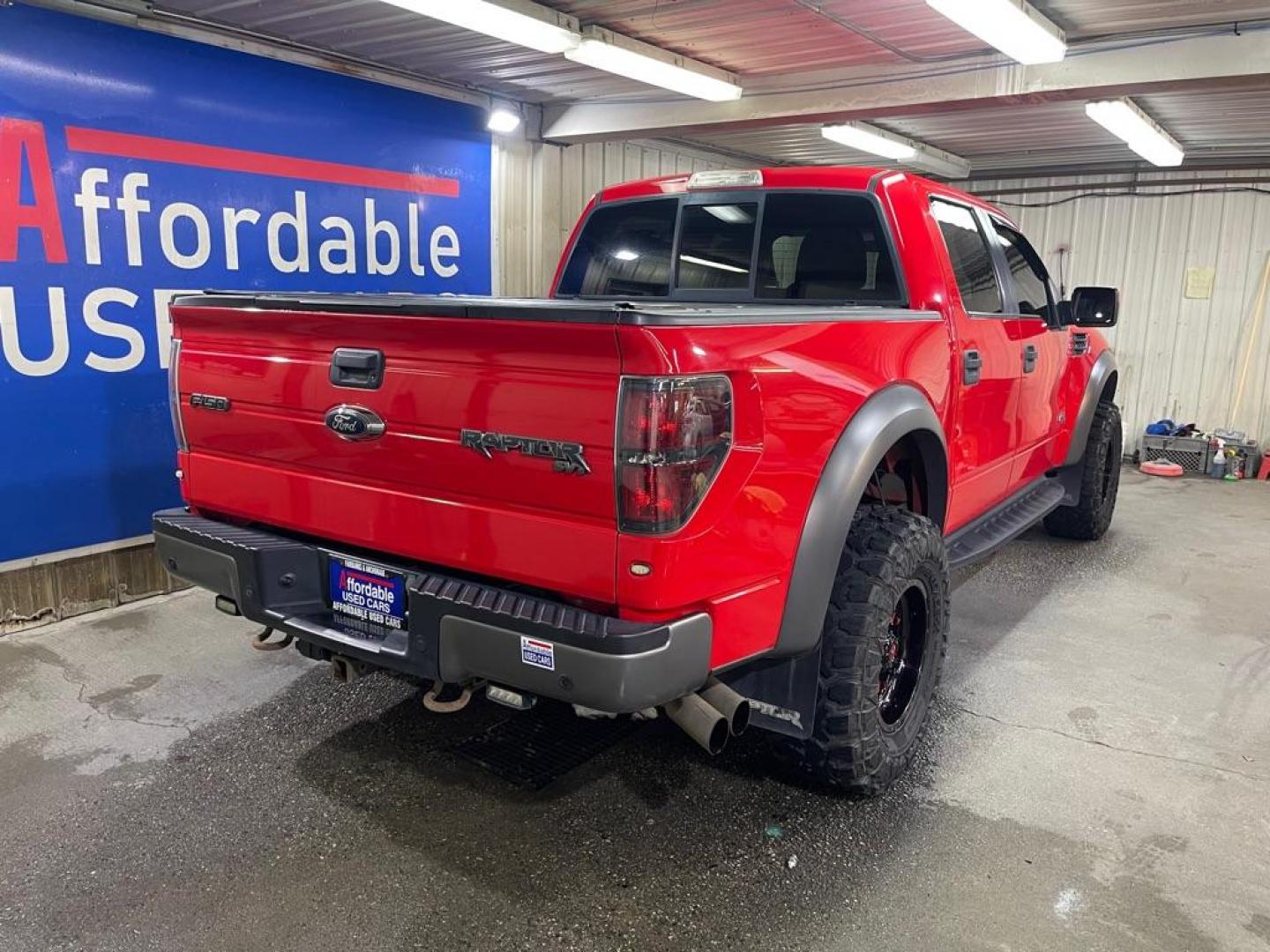 2014 RED FORD F150 SVT RAPTOR (1FTFW1R6XEF) with an 6.2L engine, Automatic transmission, located at 2525 S. Cushman, Fairbanks, AK, 99701, (907) 452-5707, 64.824036, -147.712311 - Photo#2
