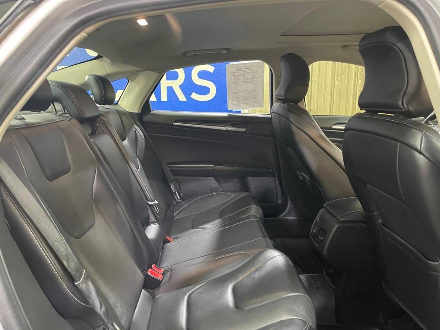 2019 SILVER FORD FUSION TITANIUM (3FA6P0RU3KR) with an 2.0L engine, Continuously Variable transmission, located at 2525 S. Cushman, Fairbanks, AK, 99701, (907) 452-5707, 64.824036, -147.712311 - Photo#4