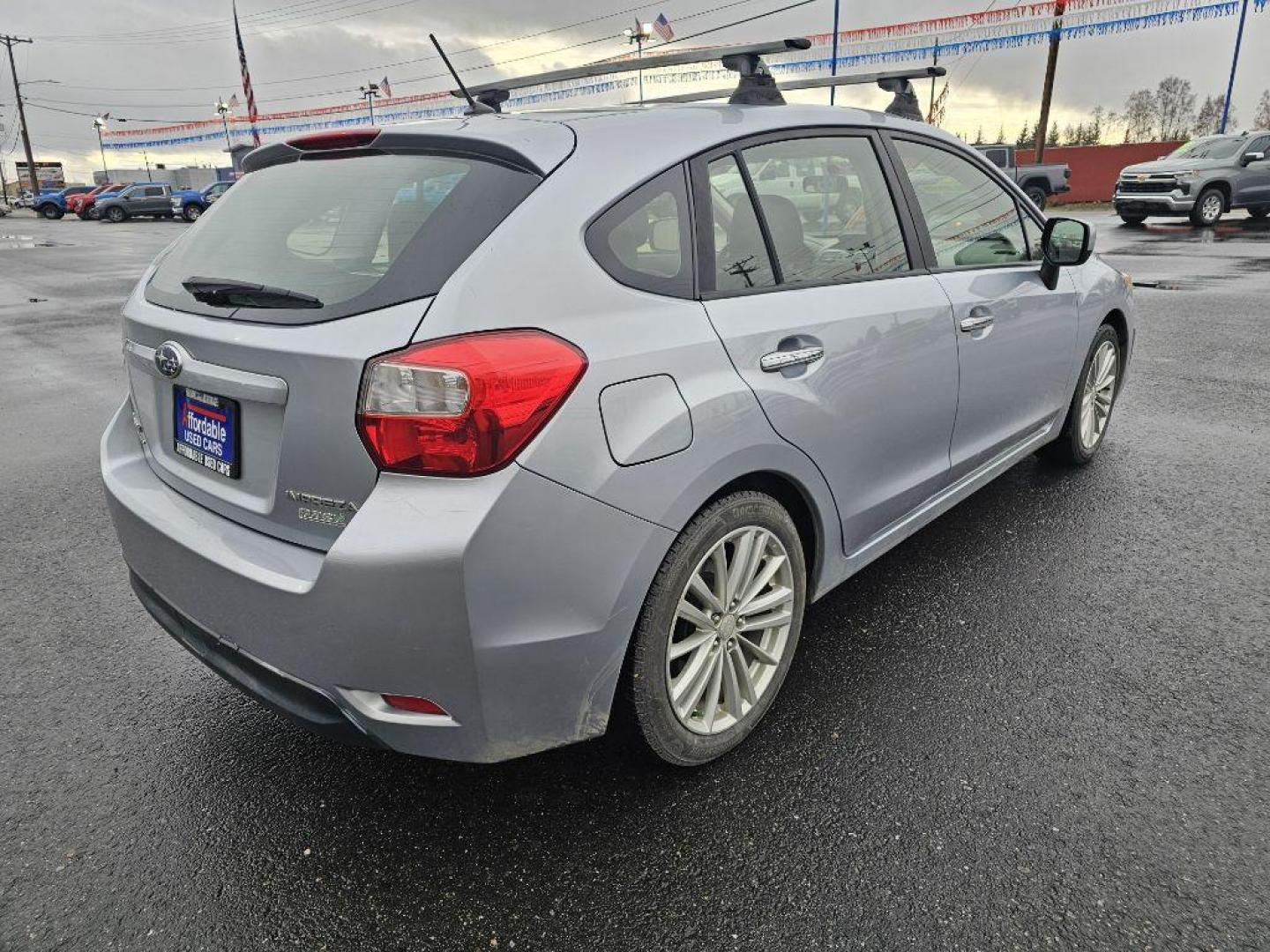 2013 SILVER SUBARU IMPREZA LIMITED (JF1GPAG60D2) with an 2.0L engine, Continuously Variable transmission, located at 2525 S. Cushman, Fairbanks, AK, 99701, (907) 452-5707, 64.824036, -147.712311 - Photo#0
