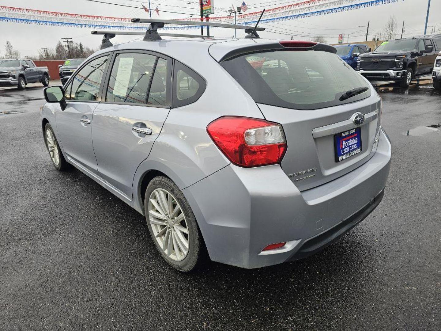 2013 SILVER SUBARU IMPREZA LIMITED (JF1GPAG60D2) with an 2.0L engine, Continuously Variable transmission, located at 2525 S. Cushman, Fairbanks, AK, 99701, (907) 452-5707, 64.824036, -147.712311 - Photo#2