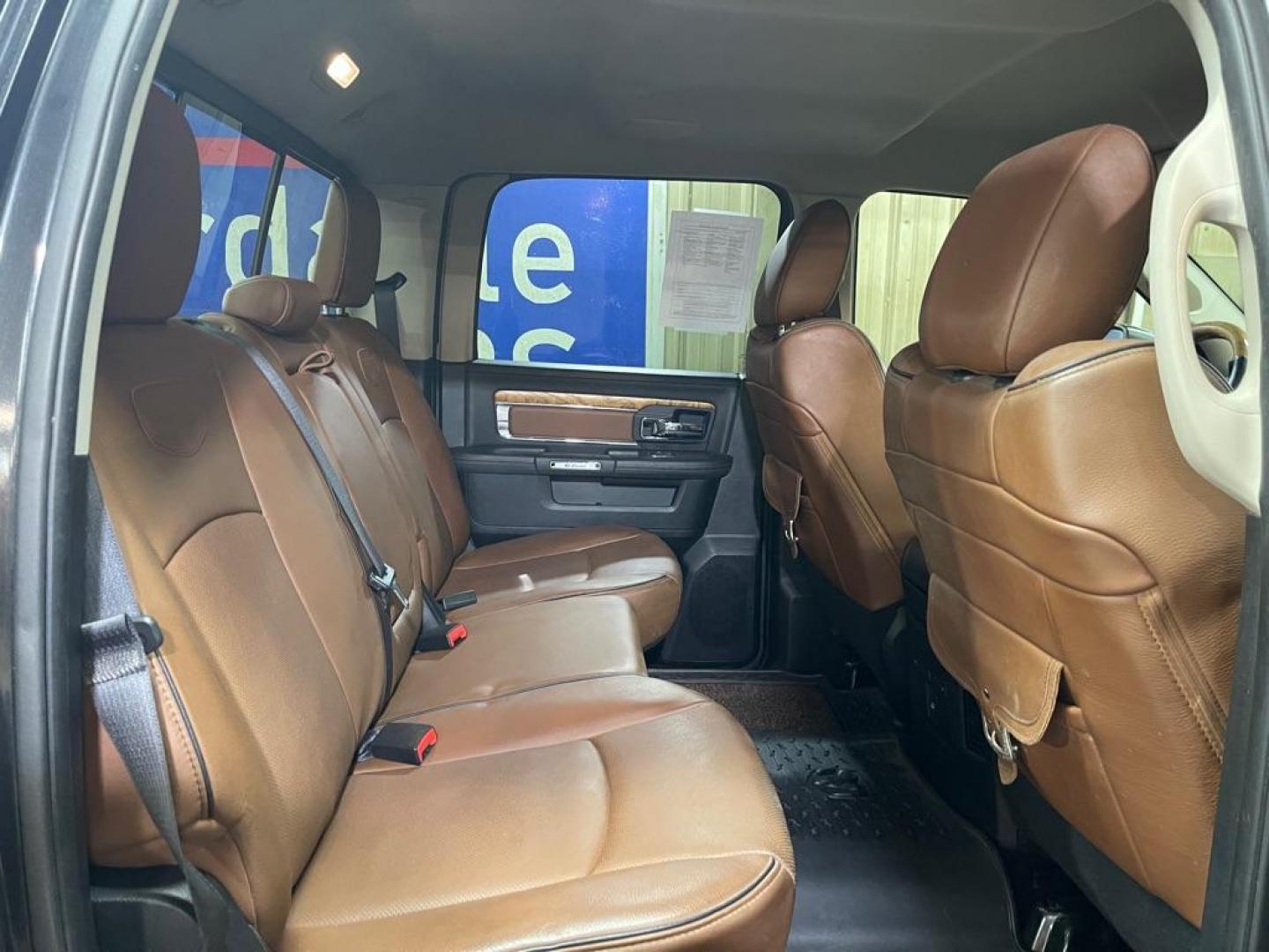 2016 BLACK RAM 1500 LONGHORN (1C6RR7PT7GS) with an 5.7L engine, Automatic transmission, located at 2525 S. Cushman, Fairbanks, AK, 99701, (907) 452-5707, 64.824036, -147.712311 - Photo#4