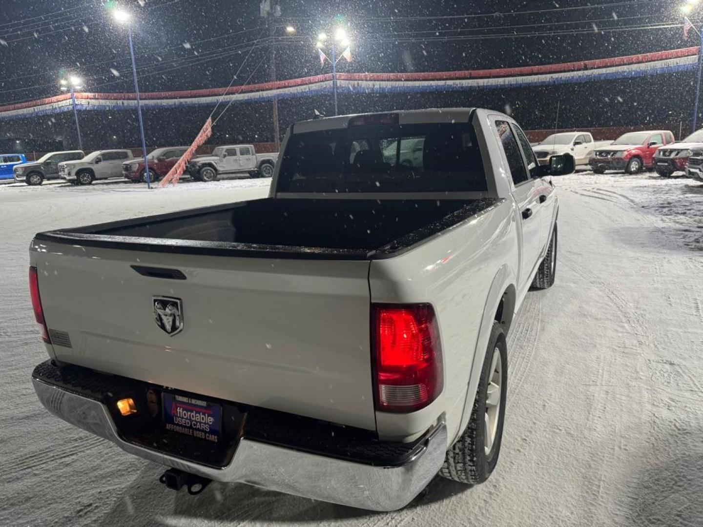 2014 WHITE RAM 1500 SLT (1C6RR7LGXES) with an 3.6L engine, Automatic transmission, located at 2525 S. Cushman, Fairbanks, AK, 99701, (907) 452-5707, 64.824036, -147.712311 - Photo#2