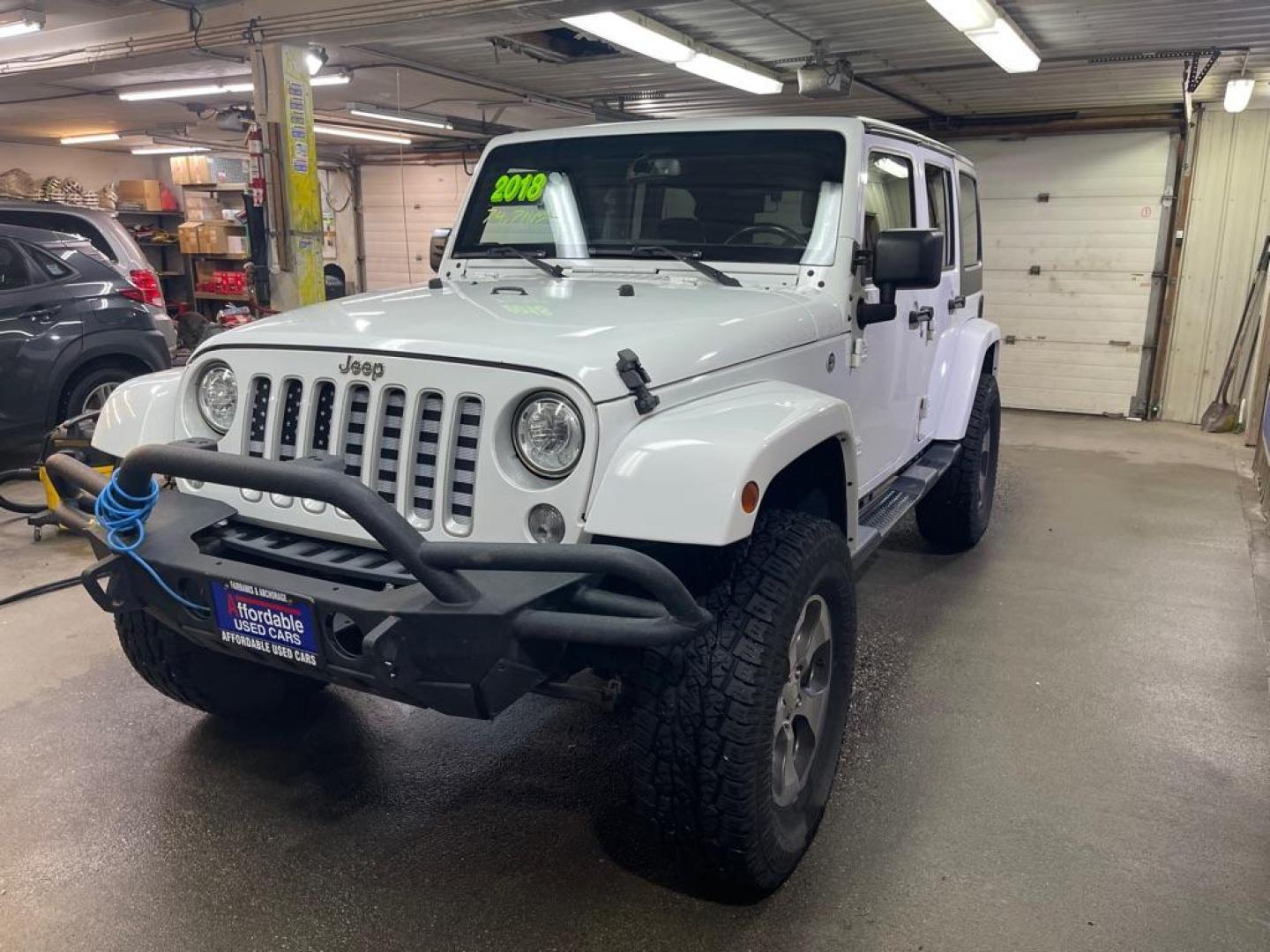 2018 WHITE JEEP WRANGLER UNLIMI SAHARA (1C4HJWEGXJL) with an 3.6L engine, Automatic transmission, located at 2525 S. Cushman, Fairbanks, AK, 99701, (907) 452-5707, 64.824036, -147.712311 - Photo#1