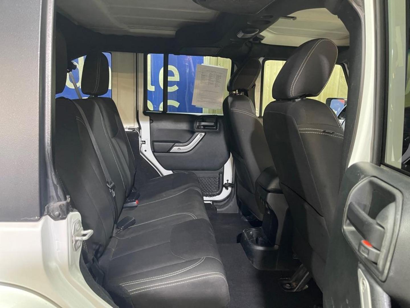 2018 WHITE JEEP WRANGLER UNLIMI SAHARA (1C4HJWEGXJL) with an 3.6L engine, Automatic transmission, located at 2525 S. Cushman, Fairbanks, AK, 99701, (907) 452-5707, 64.824036, -147.712311 - Photo#4