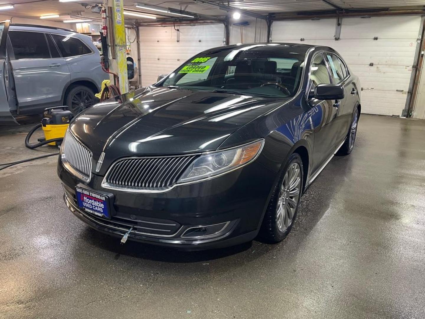 2015 BLACK LINCOLN MKS (1LNHL9DK4FG) with an 3.7L engine, Automatic transmission, located at 2525 S. Cushman, Fairbanks, AK, 99701, (907) 452-5707, 64.824036, -147.712311 - Photo#1