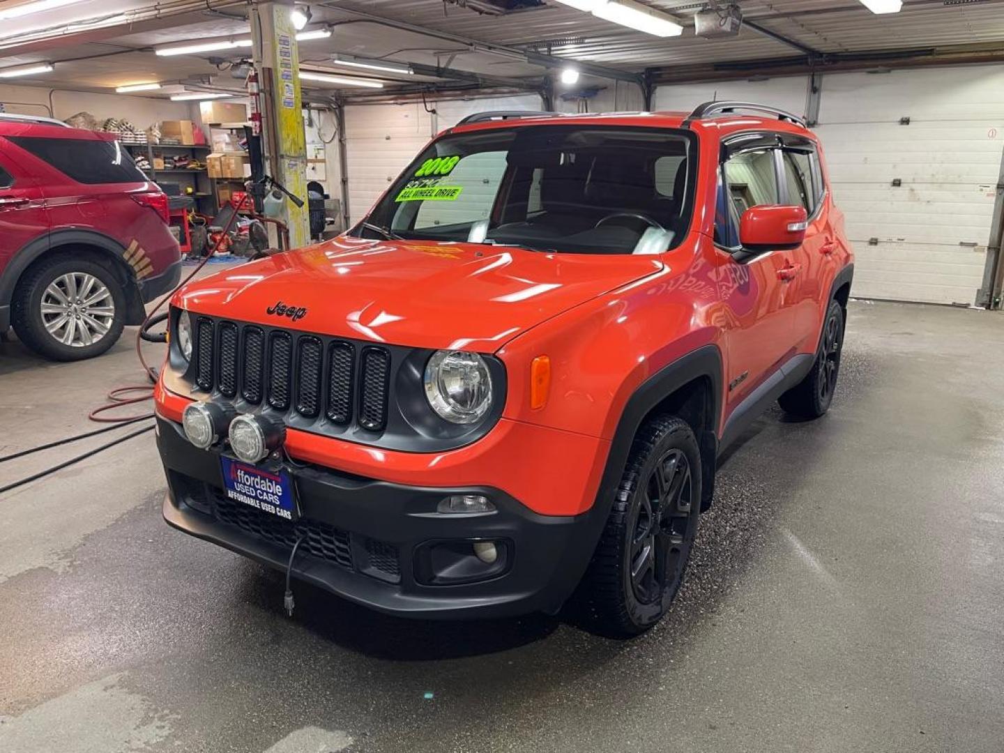 2018 ORANGE JEEP RENEGADE LATITUDE (ZACCJBBBXJP) with an 2.4L engine, Automatic transmission, located at 2525 S. Cushman, Fairbanks, AK, 99701, (907) 452-5707, 64.824036, -147.712311 - Photo#1