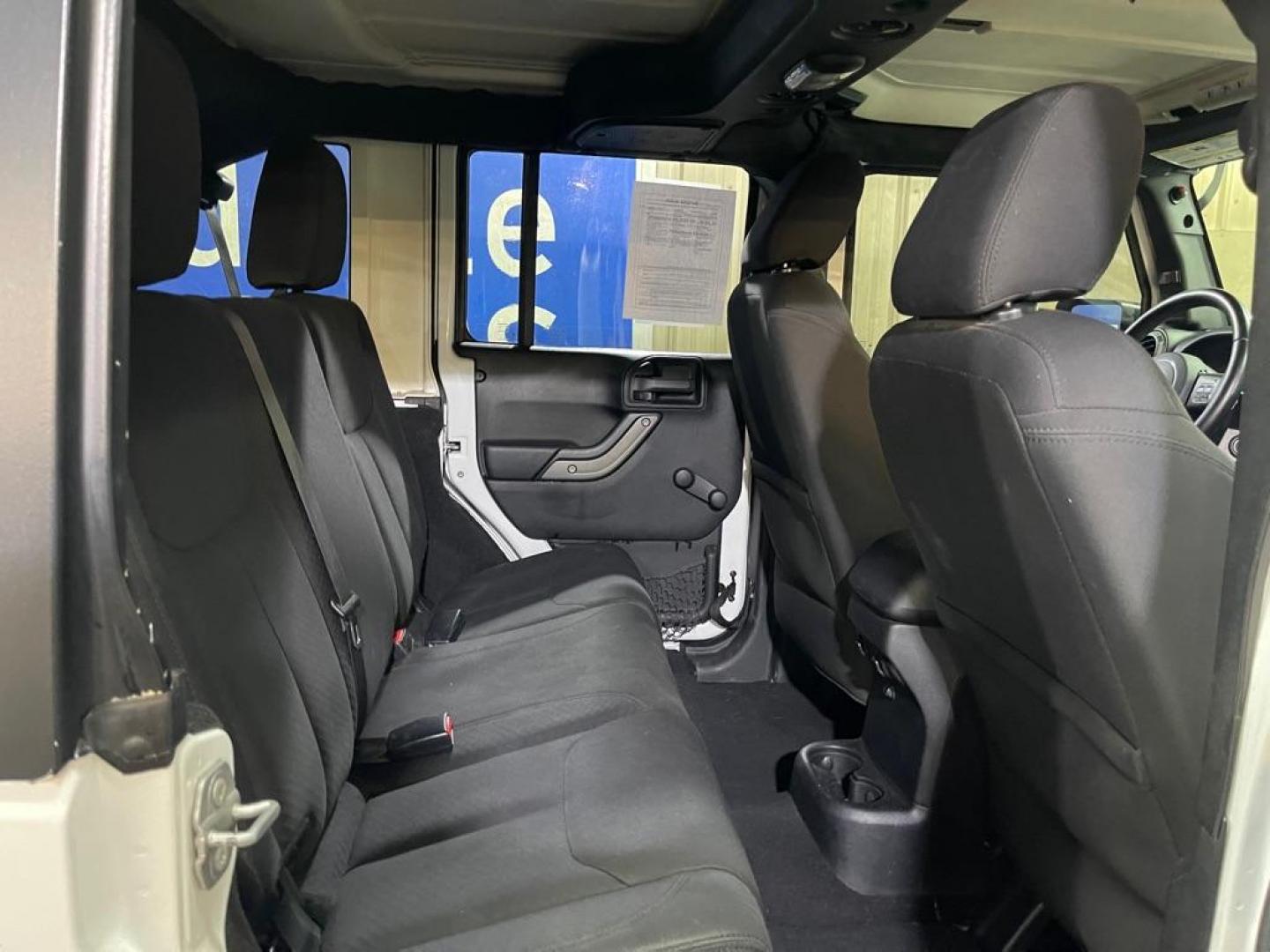 2016 WHITE JEEP WRANGLER UNLIMI SPORT (1C4BJWDG9GL) with an 3.6L engine, Automatic transmission, located at 2525 S. Cushman, Fairbanks, AK, 99701, (907) 452-5707, 64.824036, -147.712311 - Photo#4