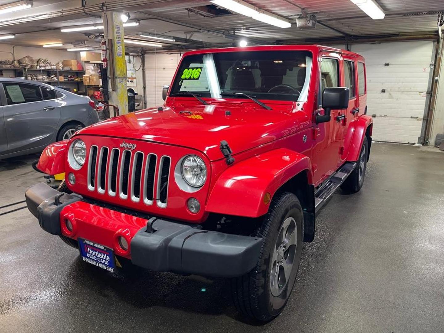 2016 RED JEEP WRANGLER UNLIMI SAHARA (1C4BJWEG2GL) with an 3.6L engine, Automatic transmission, located at 2525 S. Cushman, Fairbanks, AK, 99701, (907) 452-5707, 64.824036, -147.712311 - Photo#1