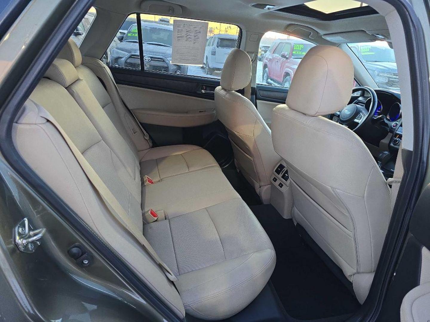 2015 GREEN SUBARU OUTBACK 2.5I LIMITED (4S4BSANC6F3) with an 2.5L engine, Continuously Variable transmission, located at 2525 S. Cushman, Fairbanks, AK, 99701, (907) 452-5707, 64.824036, -147.712311 - Photo#2