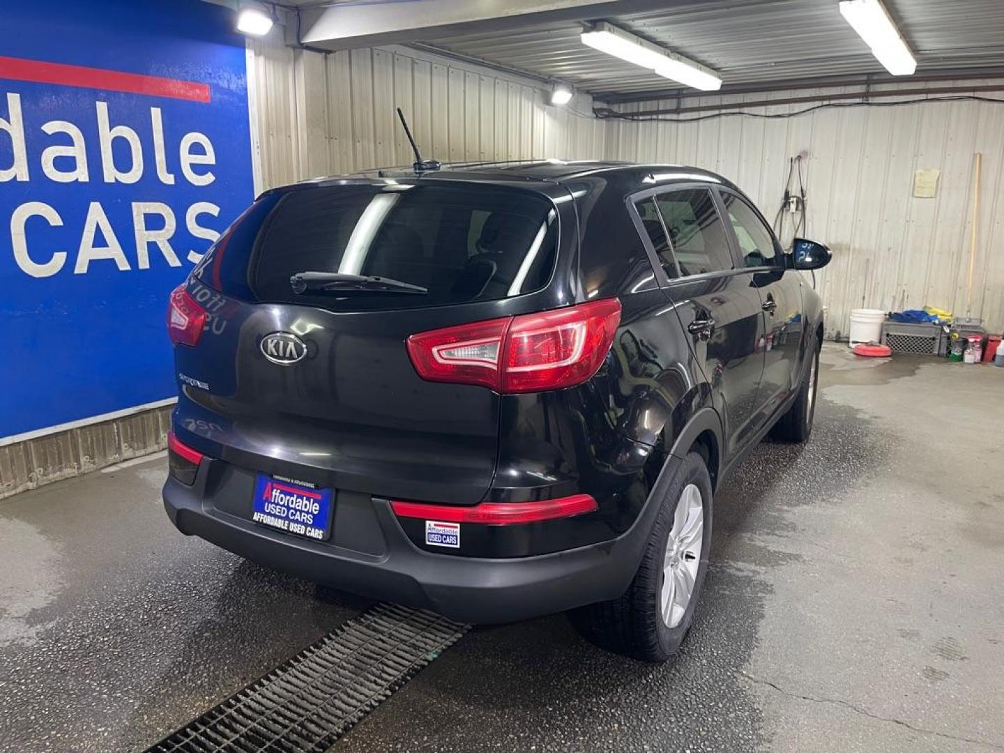 2012 BLACK KIA SPORTAGE LX (KNDPBCA25C7) with an 2.4L engine, Automatic transmission, located at 2525 S. Cushman, Fairbanks, AK, 99701, (907) 452-5707, 64.824036, -147.712311 - Photo#2