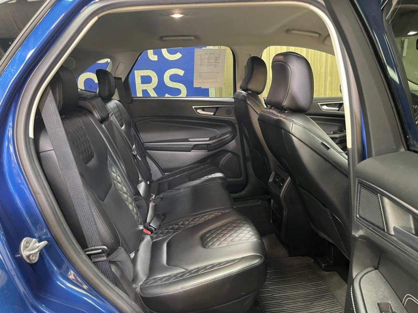 2023 BLUE FORD EDGE TITANIUM (2FMPK4K96PB) with an 2.0L engine, Automatic transmission, located at 2525 S. Cushman, Fairbanks, AK, 99701, (907) 452-5707, 64.824036, -147.712311 - Photo#4