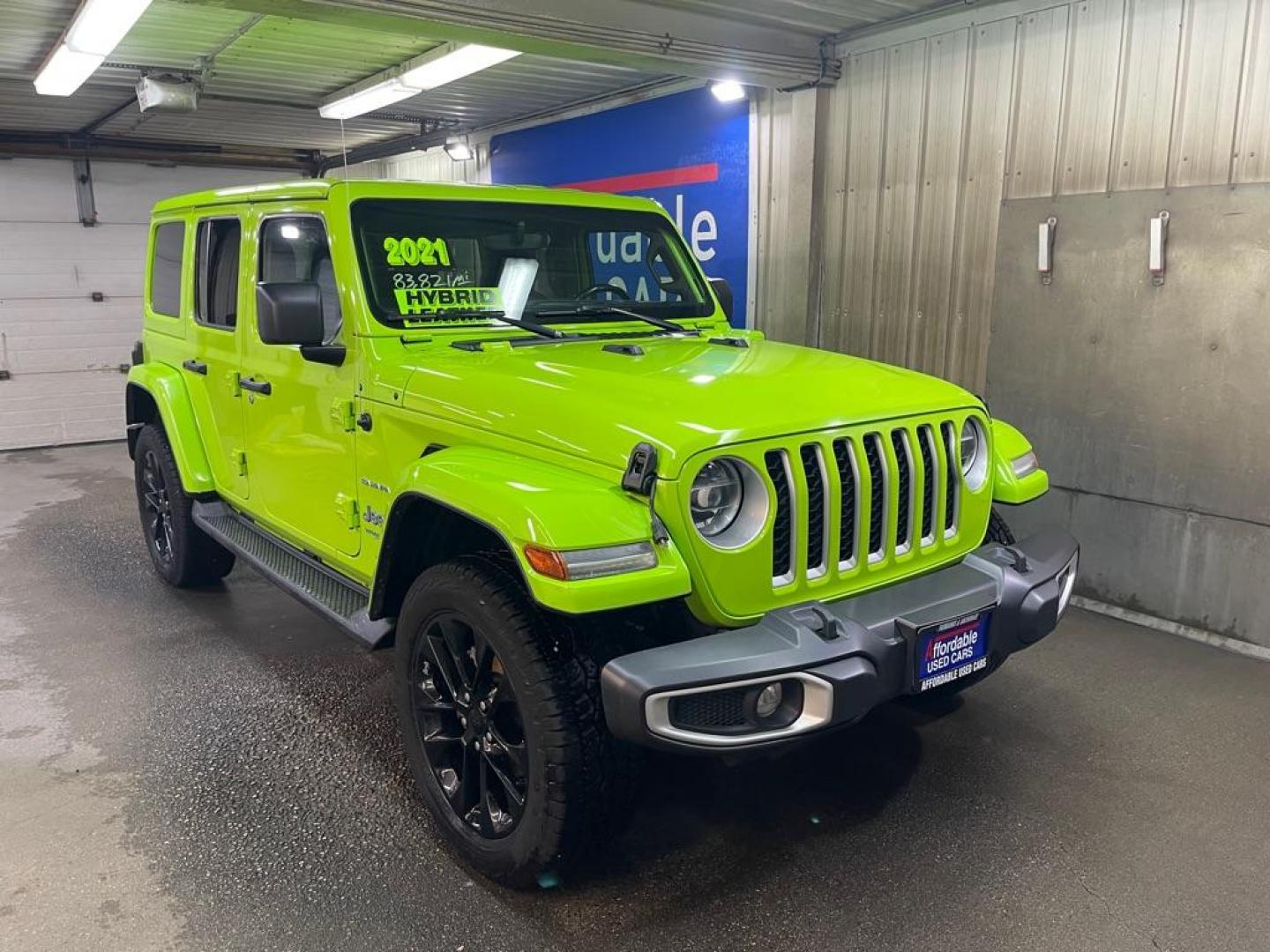 2021 GREEN JEEP WRANGLER UNLIMI SAHARA 4XE (1C4JJXP62MW) with an 2.0L engine, Automatic transmission, located at 2525 S. Cushman, Fairbanks, AK, 99701, (907) 452-5707, 64.824036, -147.712311 - Photo#0