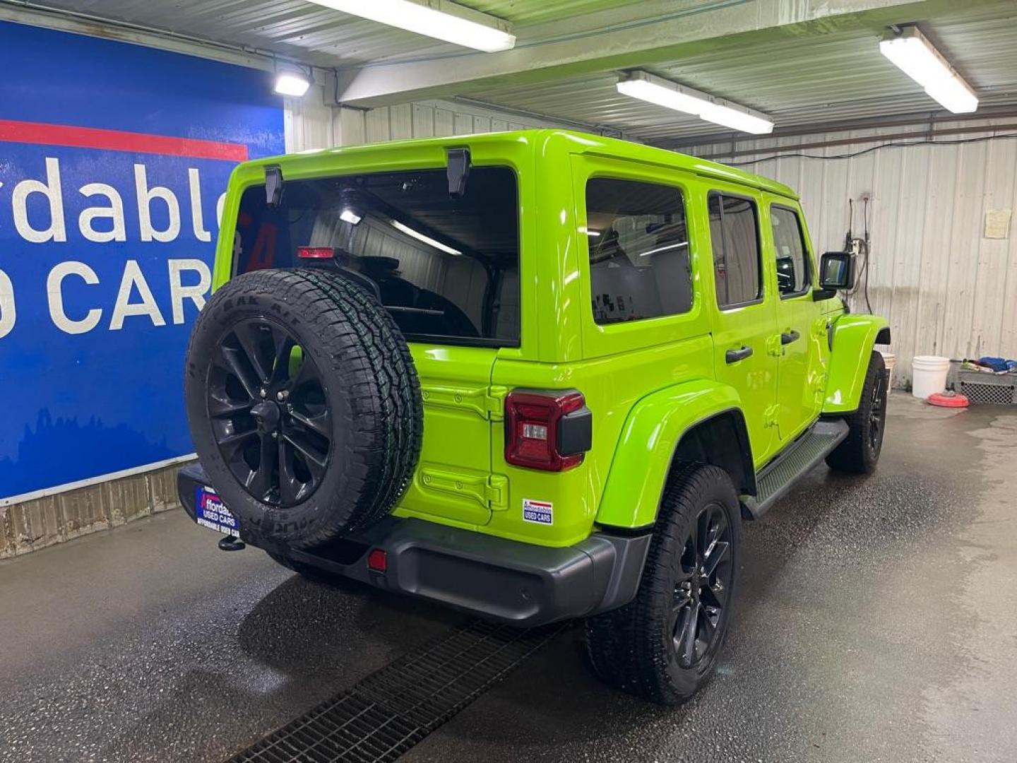 2021 GREEN JEEP WRANGLER UNLIMI SAHARA 4XE (1C4JJXP62MW) with an 2.0L engine, Automatic transmission, located at 2525 S. Cushman, Fairbanks, AK, 99701, (907) 452-5707, 64.824036, -147.712311 - Photo#2