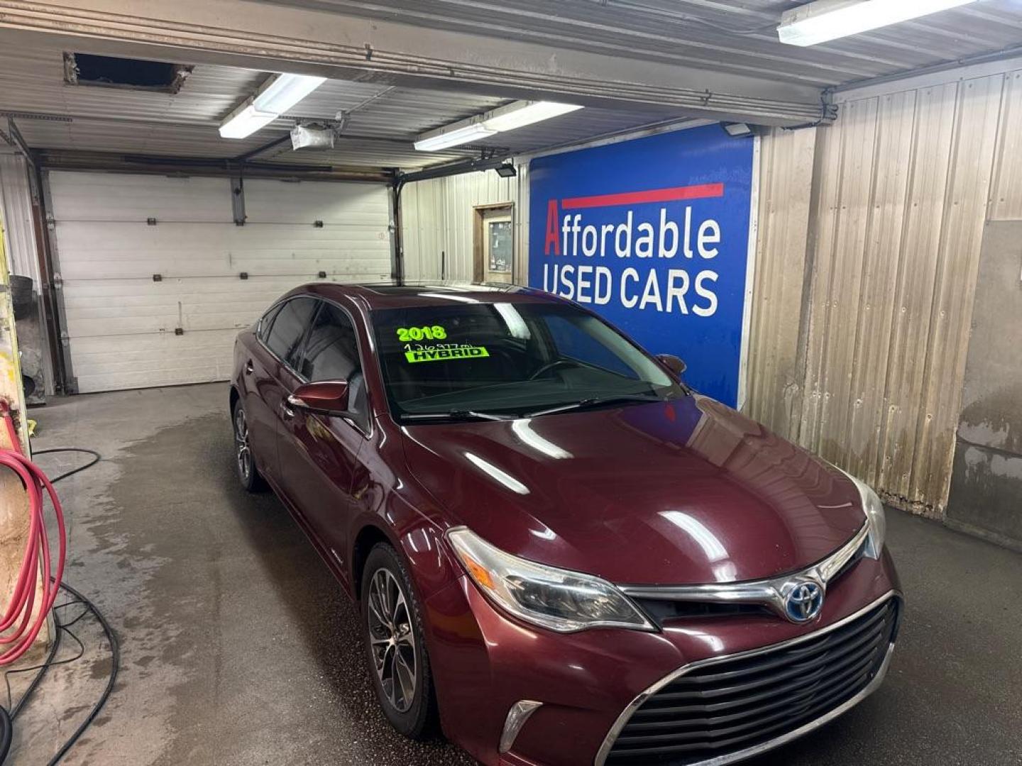 2016 MAROON TOYOTA AVALON HYBRID (4T1BD1EB1GU) with an 2.5L engine, Automatic transmission, located at 2525 S. Cushman, Fairbanks, AK, 99701, (907) 452-5707, 64.824036, -147.712311 - Photo#0