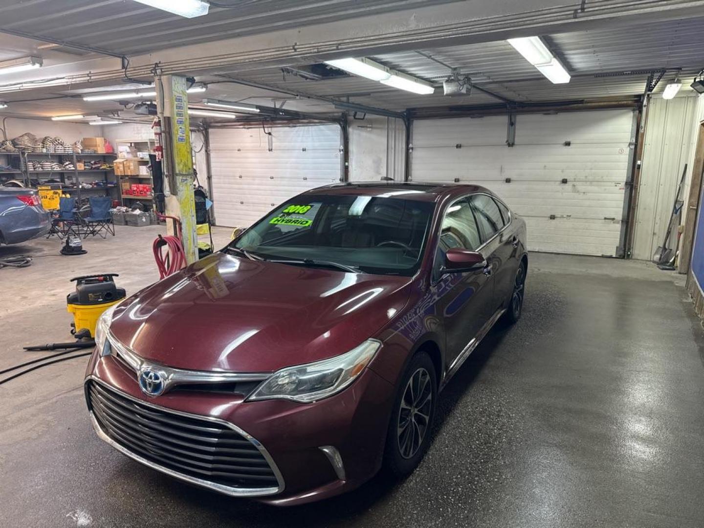 2016 MAROON TOYOTA AVALON HYBRID (4T1BD1EB1GU) with an 2.5L engine, Automatic transmission, located at 2525 S. Cushman, Fairbanks, AK, 99701, (907) 452-5707, 64.824036, -147.712311 - Photo#1