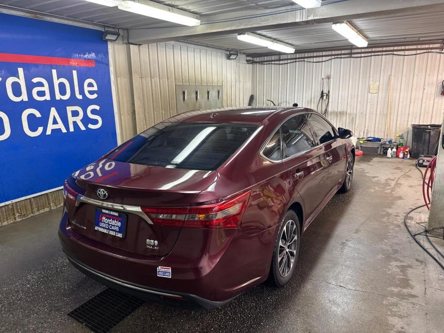2016 MAROON TOYOTA AVALON HYBRID (4T1BD1EB1GU) with an 2.5L engine, Automatic transmission, located at 2525 S. Cushman, Fairbanks, AK, 99701, (907) 452-5707, 64.824036, -147.712311 - Photo#3