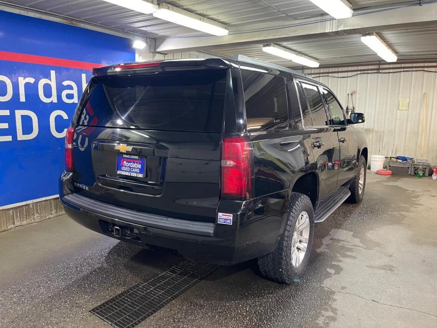 2017 BLACK CHEVROLET TAHOE 1500 LT (1GNSKBKC3HR) with an 5.3L engine, Automatic transmission, located at 2525 S. Cushman, Fairbanks, AK, 99701, (907) 452-5707, 64.824036, -147.712311 - Photo#2